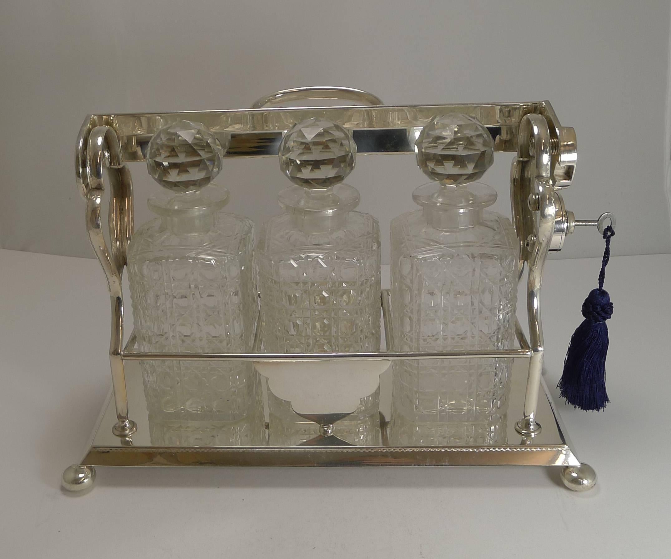 Silver Plate Antique English Three Bottle Tantalus by John Bishop Chatterley, circa 1910