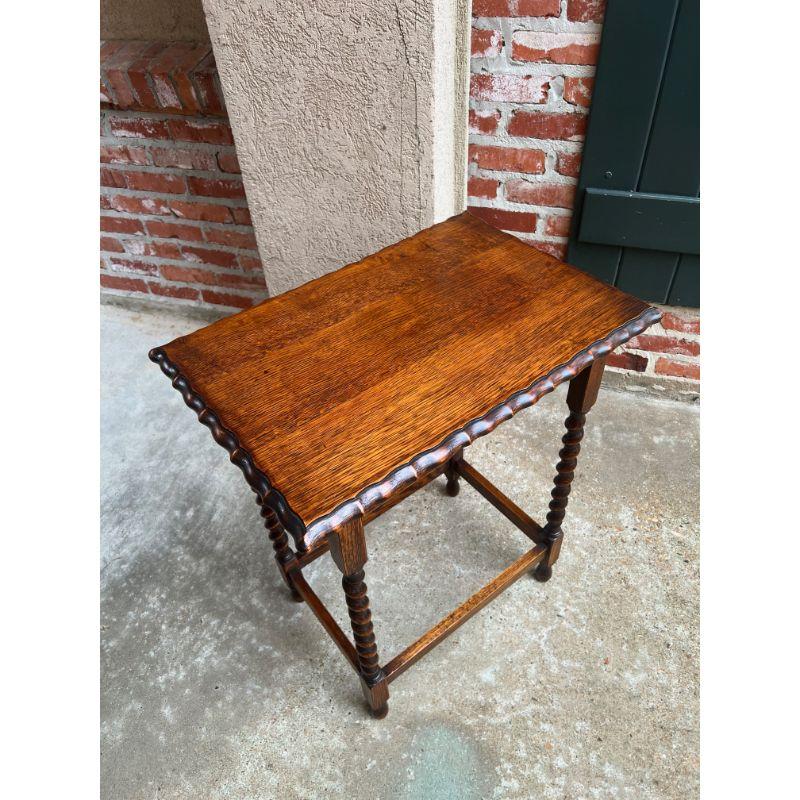 Antique English Tiger oak barley twist side sofa table scalloped edge c1910

Direct from England, with classic British style, this lovely antique English oak side or sofa table. Large rectangular beveled and scalloped edge top over a traditional