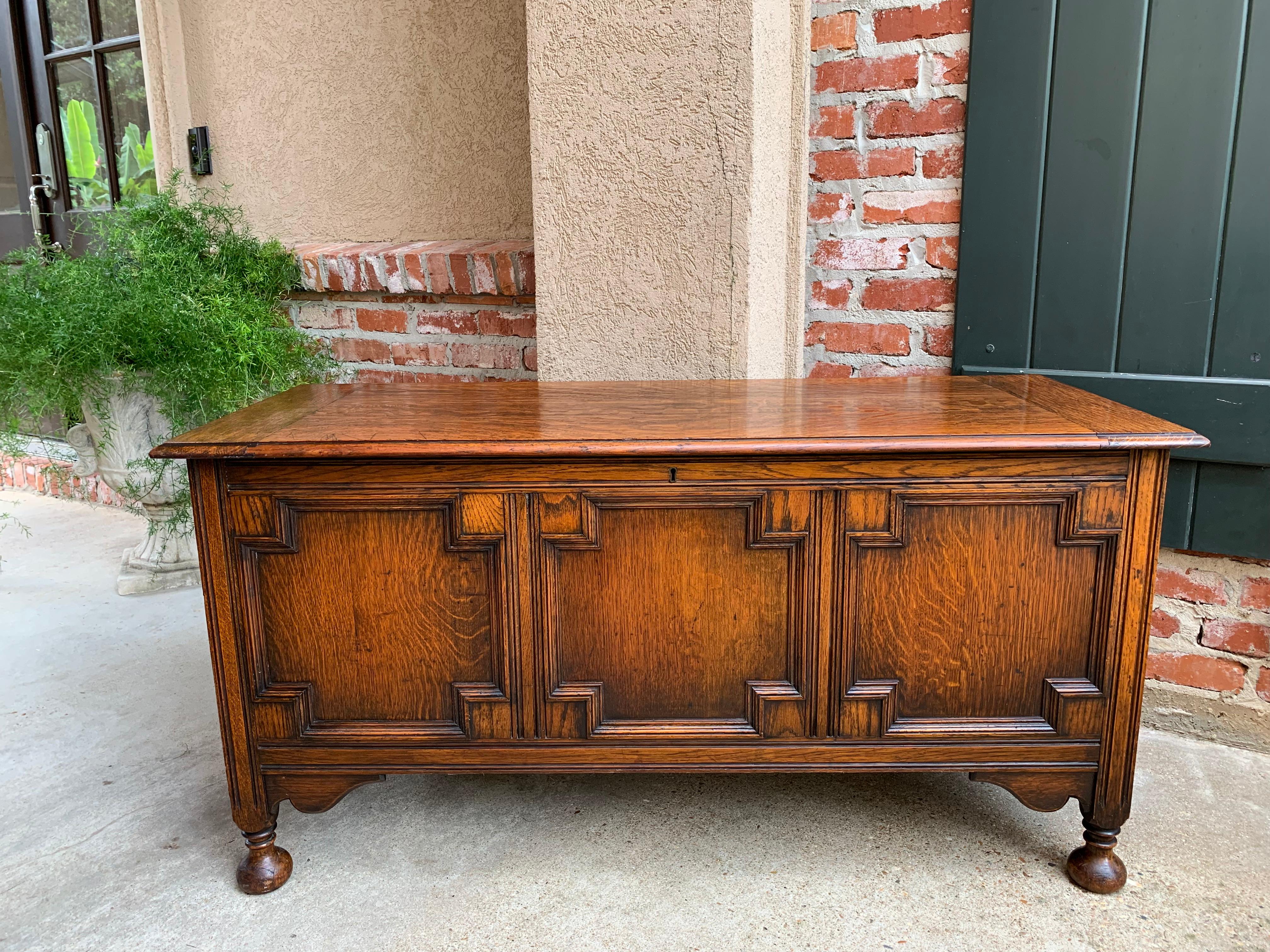 ~Direct from England~
~Large size antique English oak trunk/chest, perfect for storing extra pillows and coverings at the foot of a bed…great for the same thing behind a sofa!~
~Traditional British styling with recessed geometric trim designs and