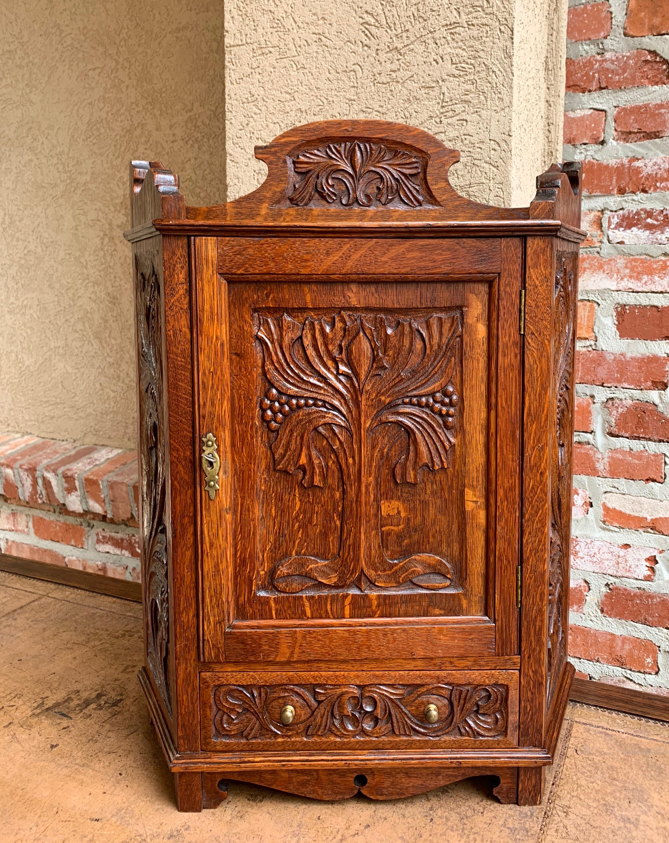 Direct from England, a lovely and versatile antique English carved oak cabinet, perfect to either hang on the wall or sit on a table/countertop~
~Heavily carved on all the panels, with scalloped edge, carved upper crown~
~Both sides have fully