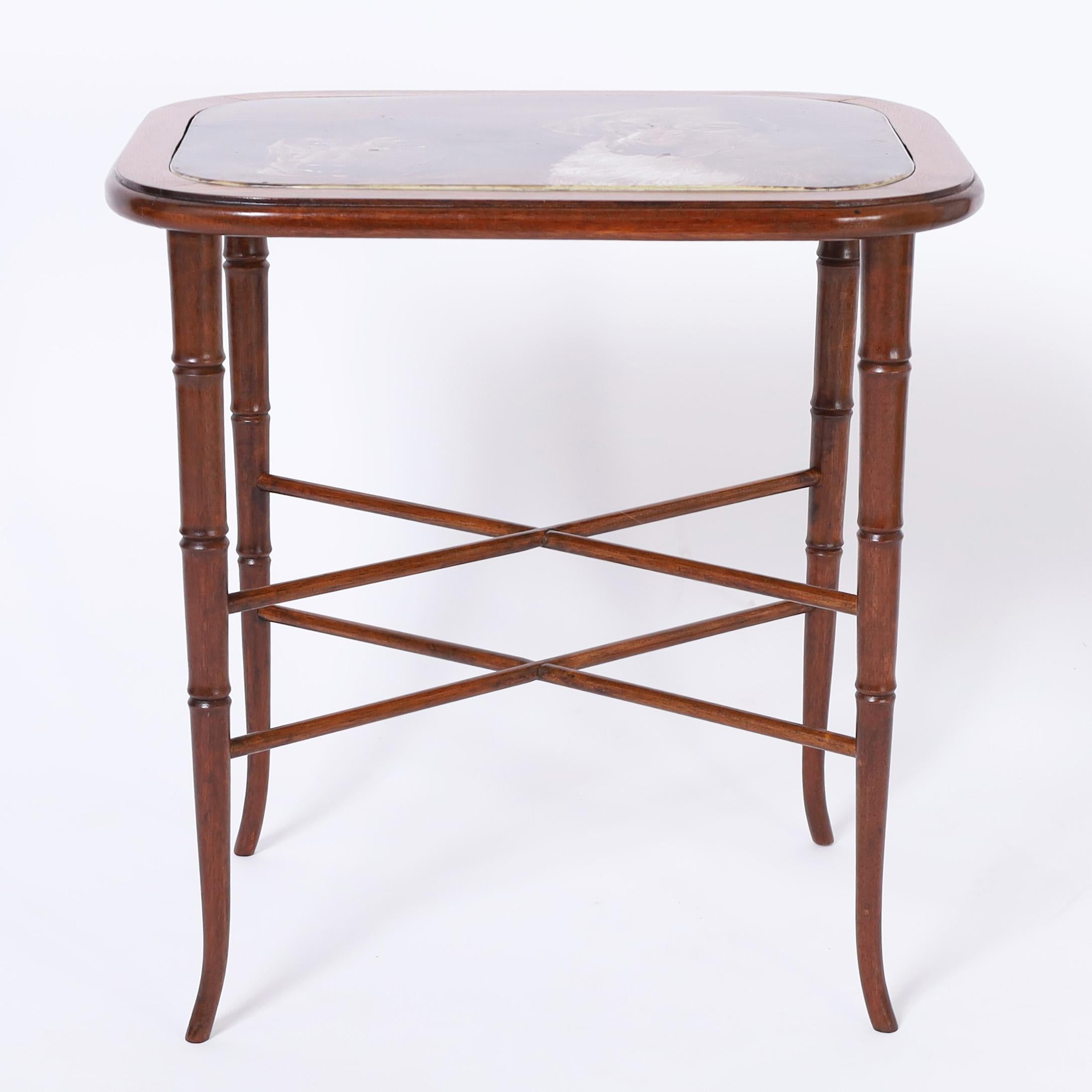 Impressive 19th century English table or stand having an earthenware top hand painted with two dogs and glazed, signed G S 1885 and set in a later custom made regency style faux bamboo base. Signed Sherwin, Cotton Hanley on the tile.