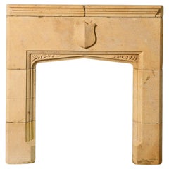 Antique English Tudor Style Limestone Fire Mantel with Shield