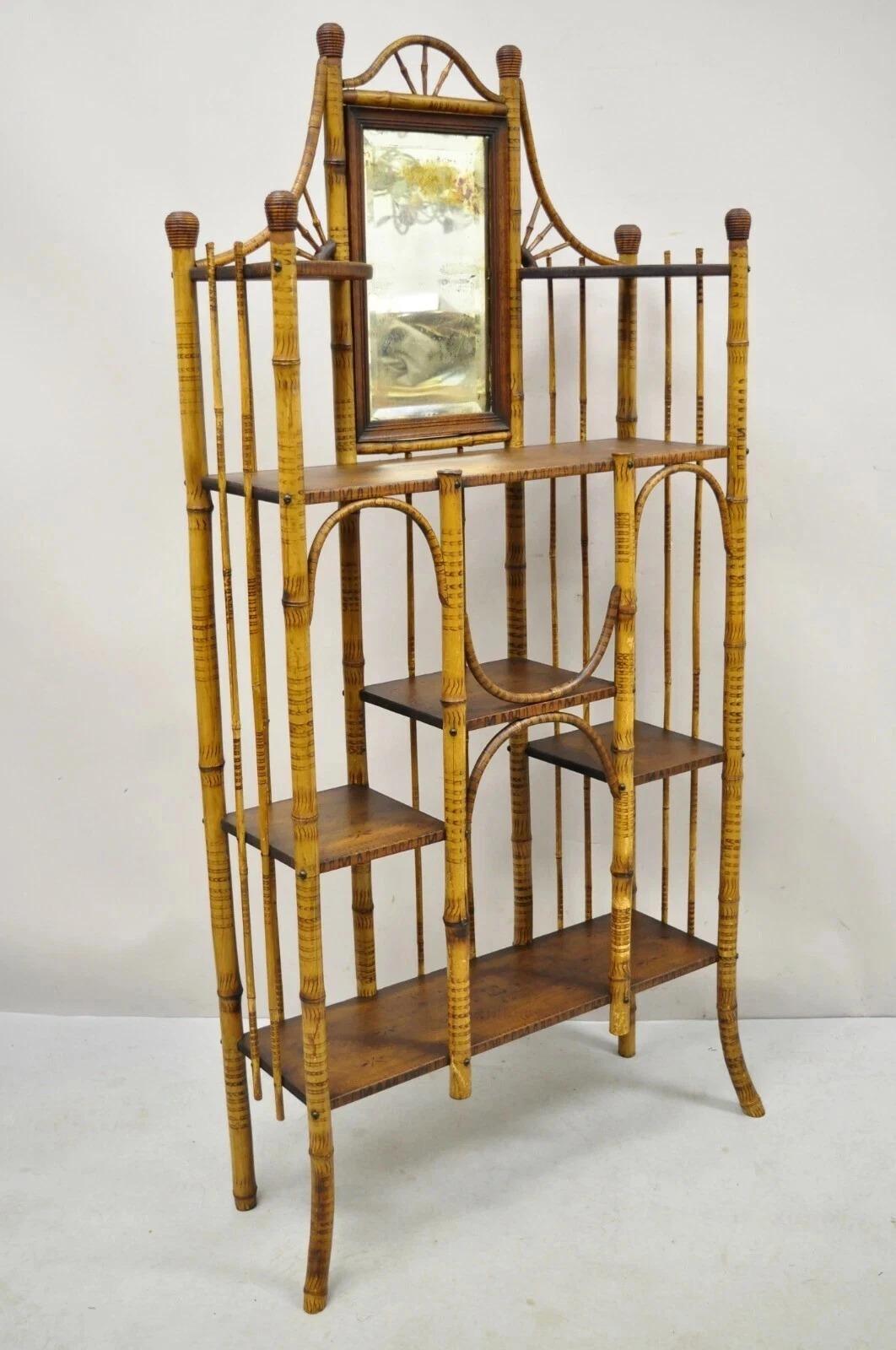 Bitte teilen Sie uns Ihre Postleitzahl mit, um ein günstigeres Angebot für den Versand innerhalb der USA anzufordern.

Antike englische viktorianische Bambus Stick und Ball Curio Regal Display Etagere. Der Artikel zeichnet sich durch eine