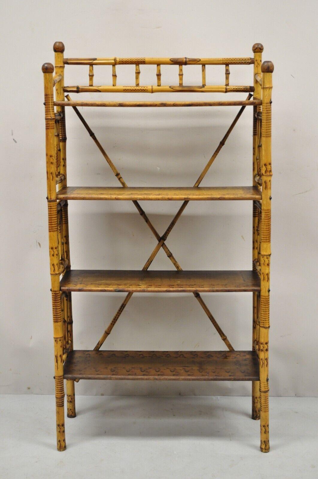  Antique English Victorian Bamboo Stick and Ball Etagere Curio Display Shelf Stand. item features 4 tiers, burnt bamboo design, bamboo wooden frame, X-form stretcher, very nice antique item Circa 19th Century. Measurements: 47.5