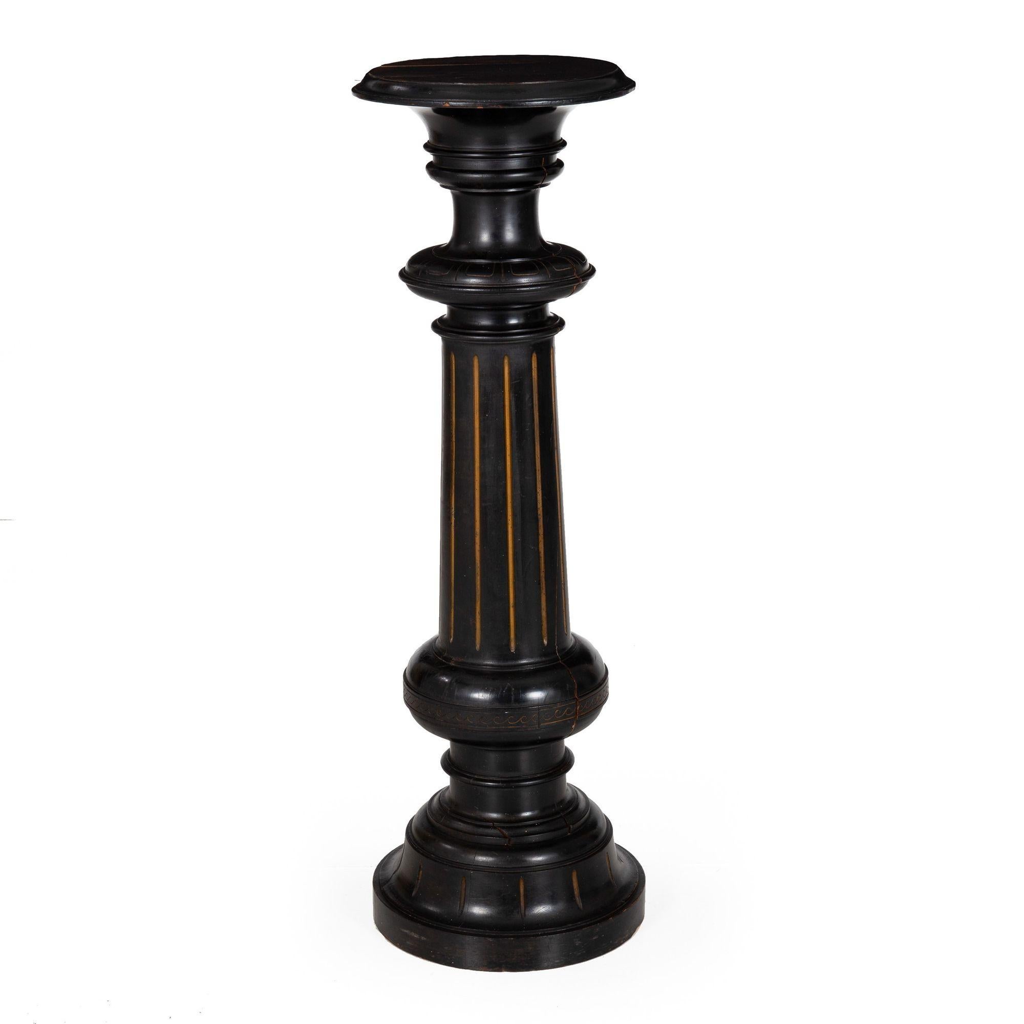 VICTORIAN GILT-INCISED AND EBONIZED PEDESTAL
Circa 1870
Item # 307XPP13L 

This useful and tasteful Victorian period sculpture pedestal features an overall nearly black ebonized surface with gilded fluting around the column and base and repeating