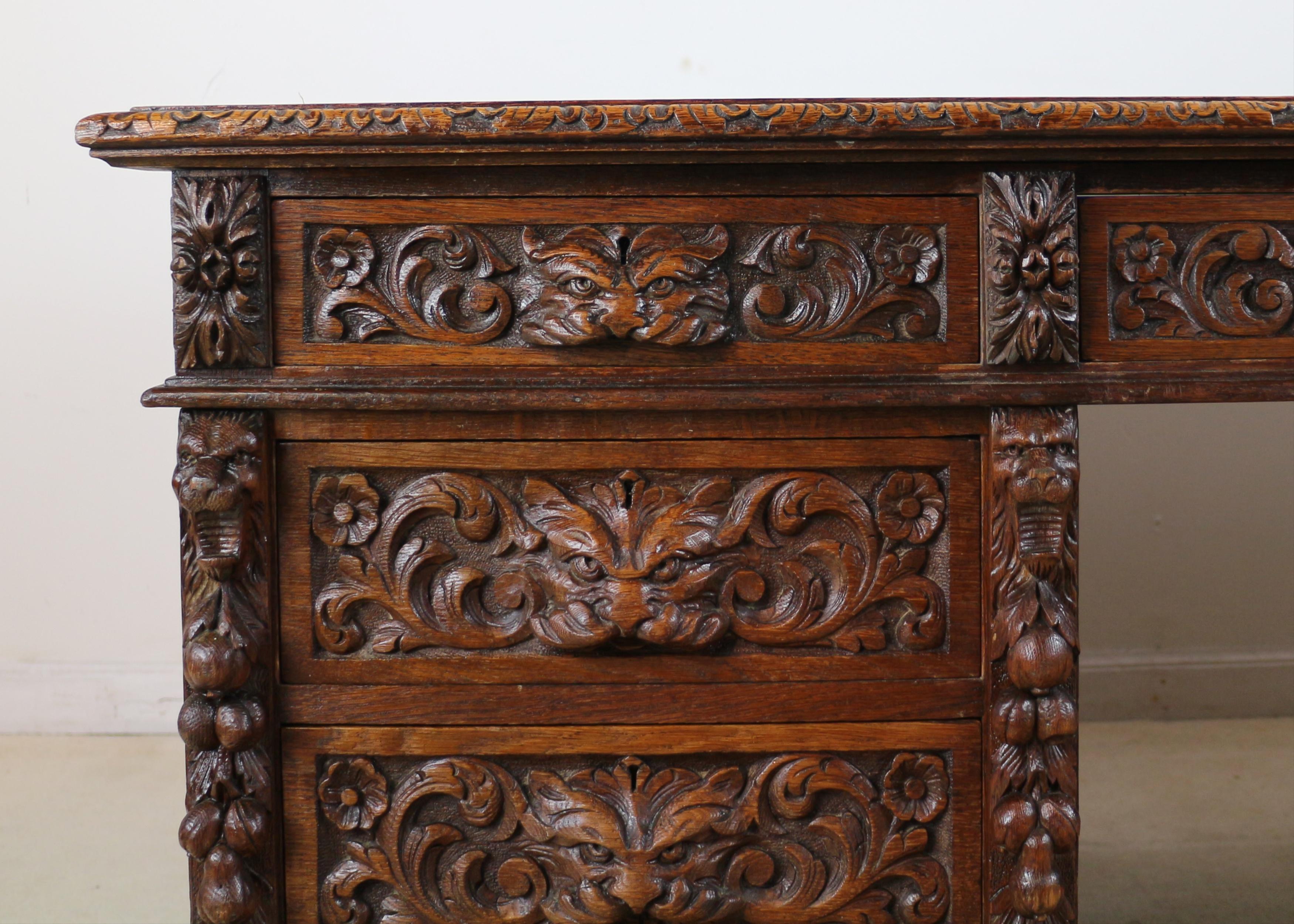 Antique English Victorian Carved Oak Elizabethan Revival Greenman Partners Desk In Good Condition In Glasgow, GB