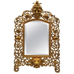 Antique English Victorian Cast Brass Ornately Framed Beveled Mirror, circa 1880