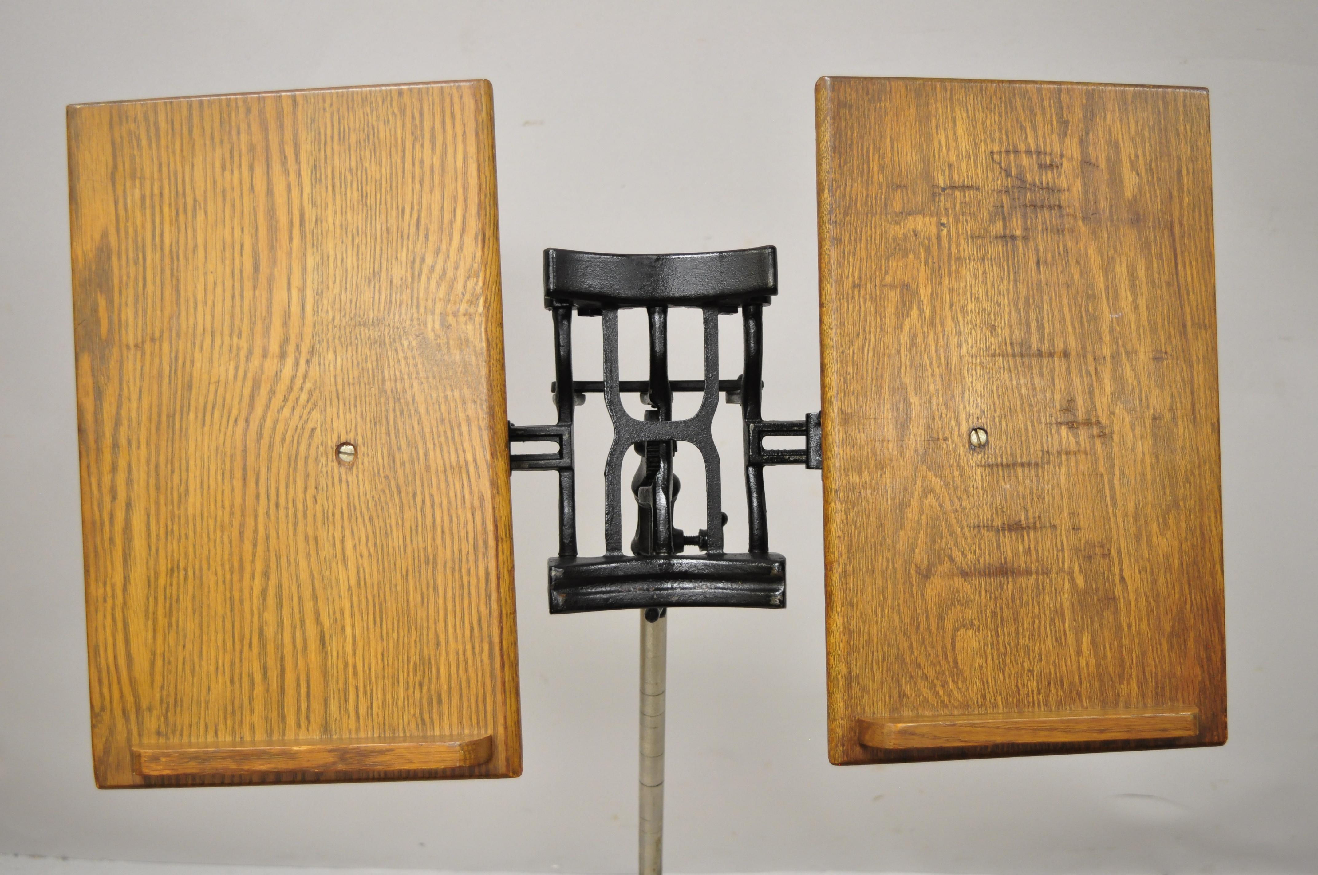 antique cast iron book stand
