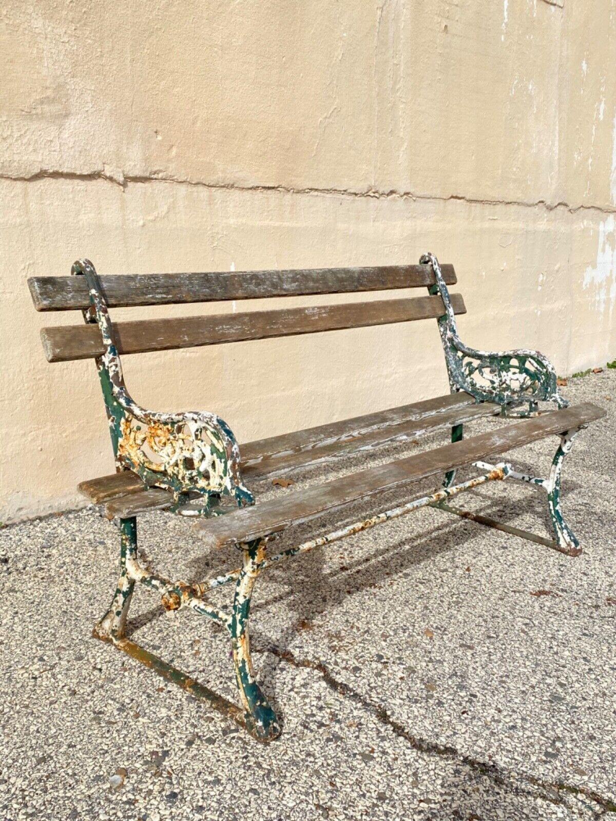 Antique English Victorian Cast Iron Wooden Slat Garden Seat Patio Park Bench. Cast iron leafy scroll frame, iron stretcher, 