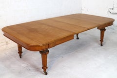 Antique English Victorian Golden Oak Extending Dining Table and Two Leaves