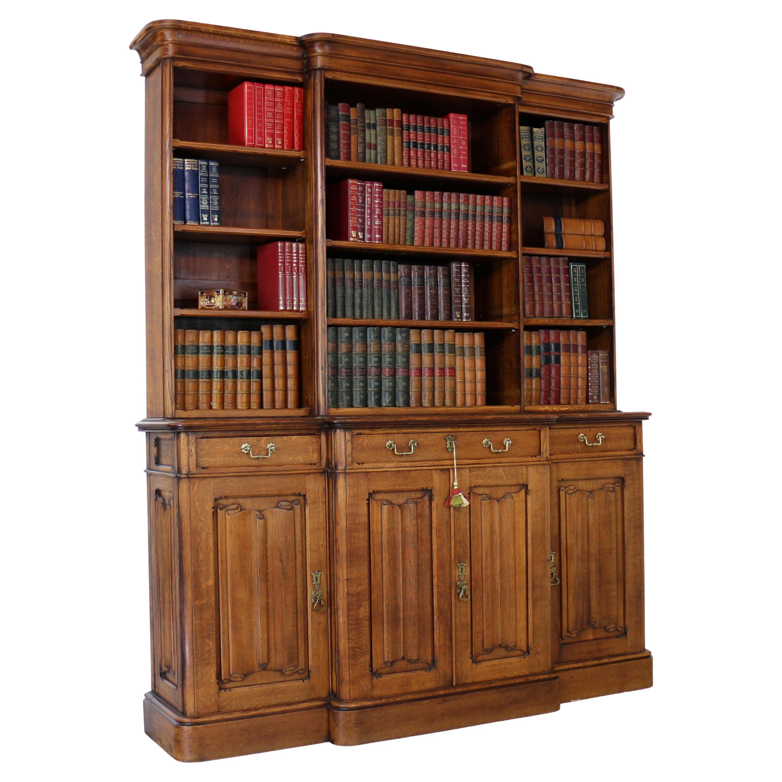 Antique English Victorian Gothic Revival Arts & Crafts Oak Breakfront Bookcase For Sale