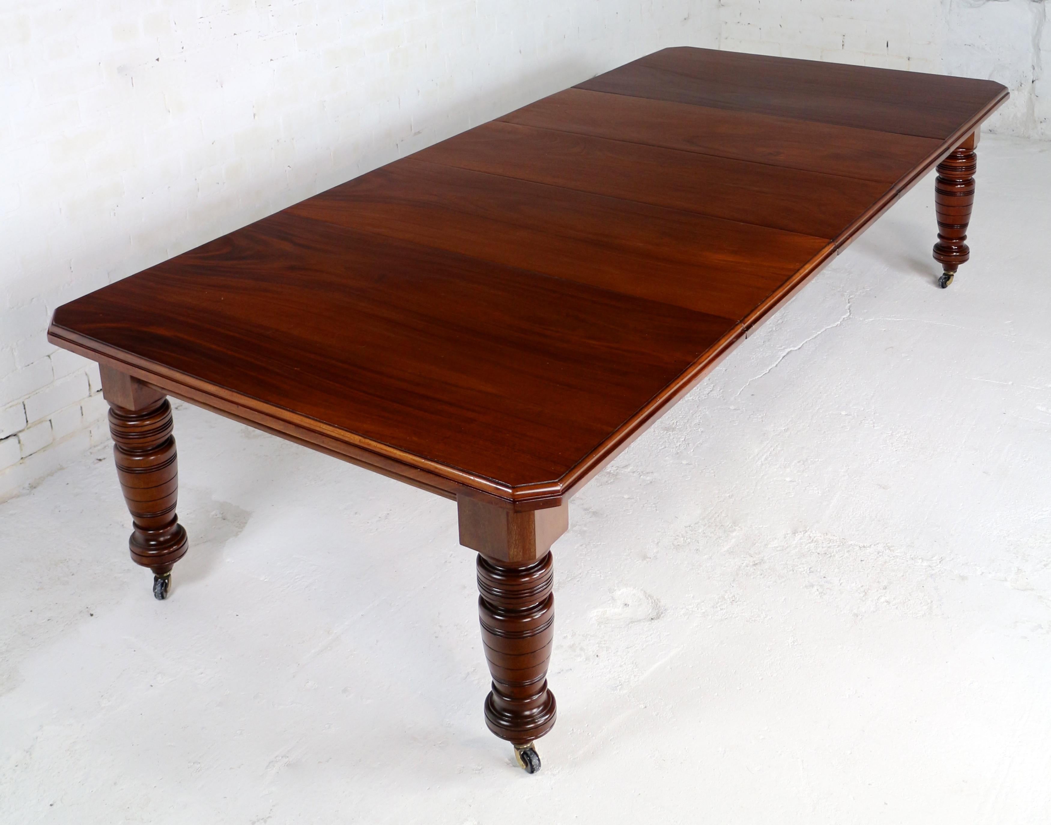 Metal Antique English Victorian Mahogany Extending Dining Table with Three Leaves
