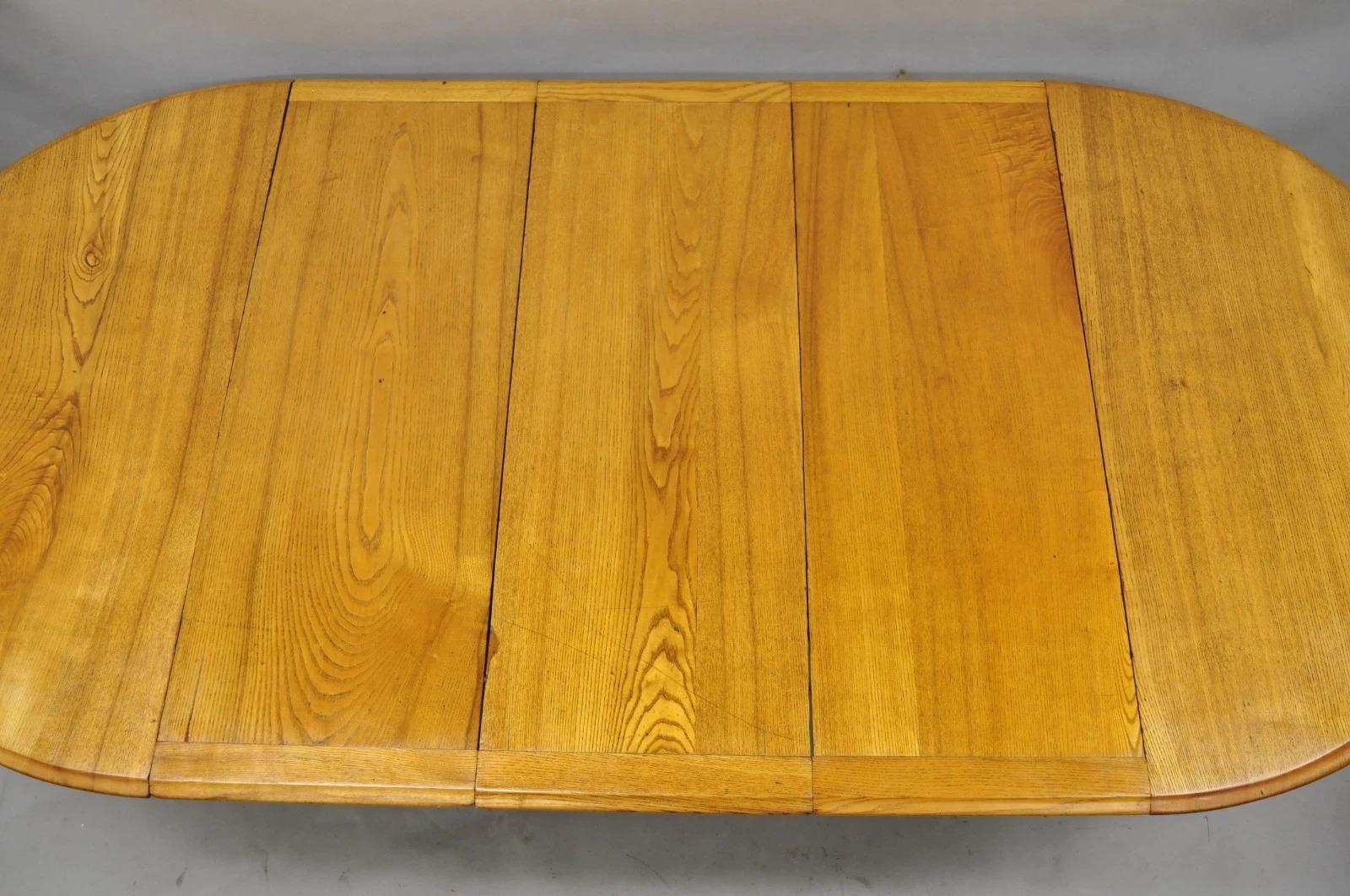 Ancienne table de salle à manger à rallonge en chêne et bois d'orme anglais victorien avec 3 abattants en vente 5