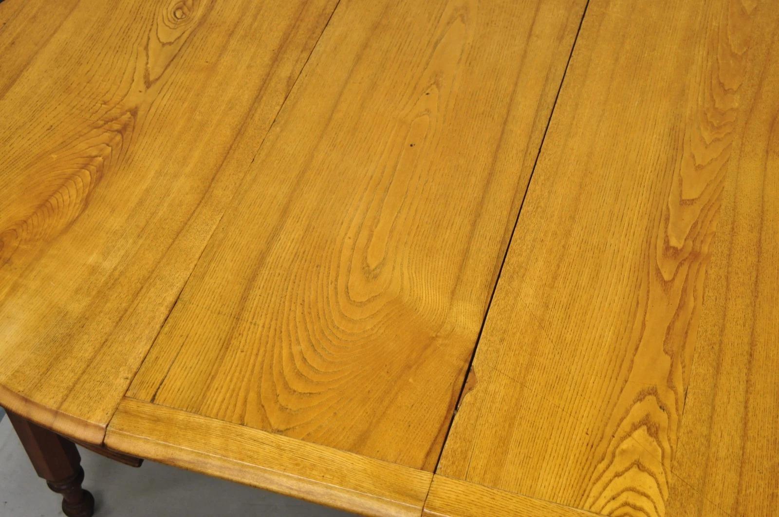 Ancienne table de salle à manger à rallonge en chêne et bois d'orme anglais victorien avec 3 abattants en vente 6