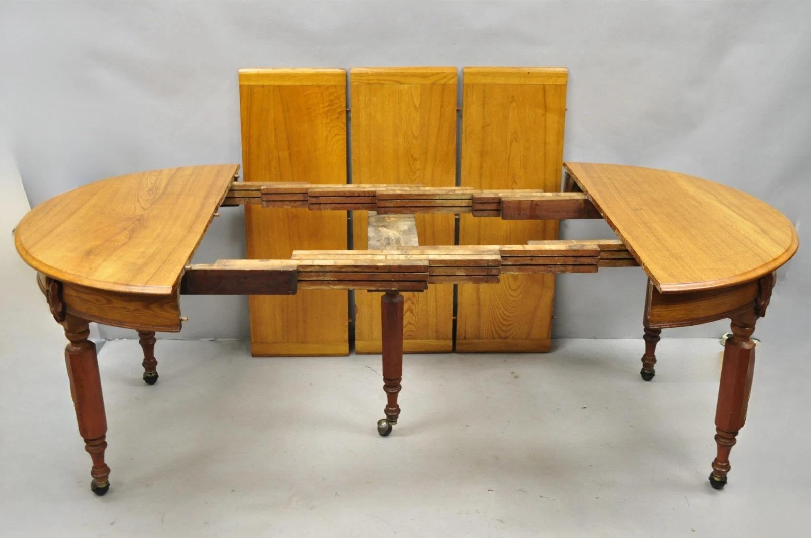 Ancienne table de salle à manger à rallonge en chêne et bois d'orme anglais victorien avec 3 abattants en vente 2