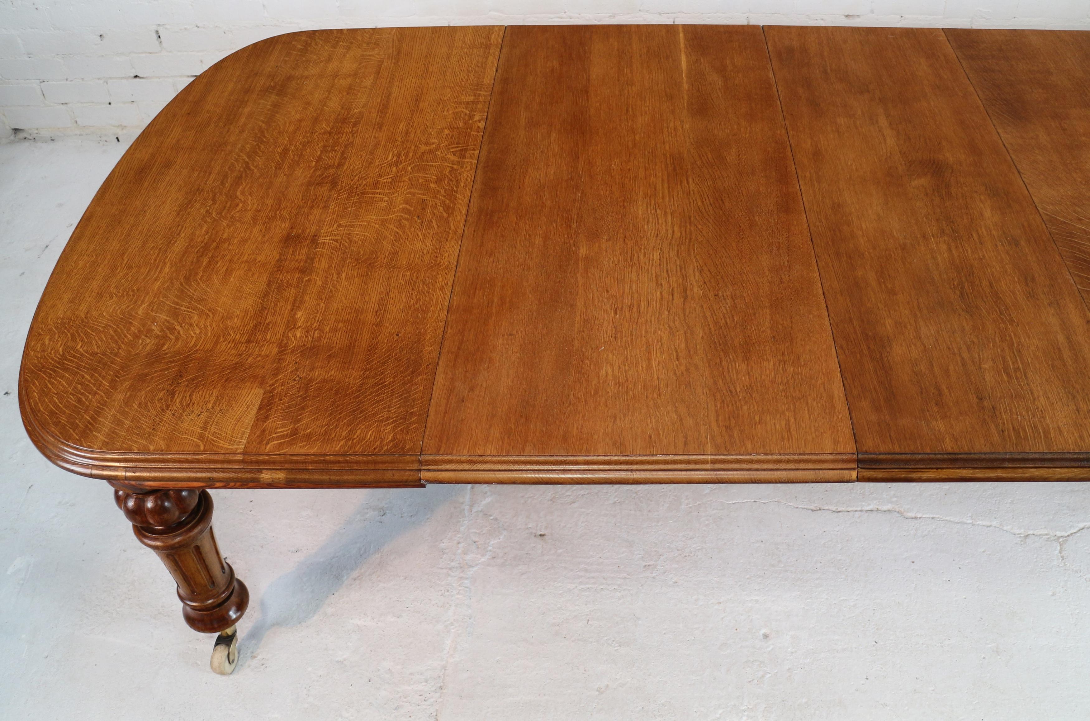 Brass Antique English Victorian Oak Extending Dining Table and Three Leaves