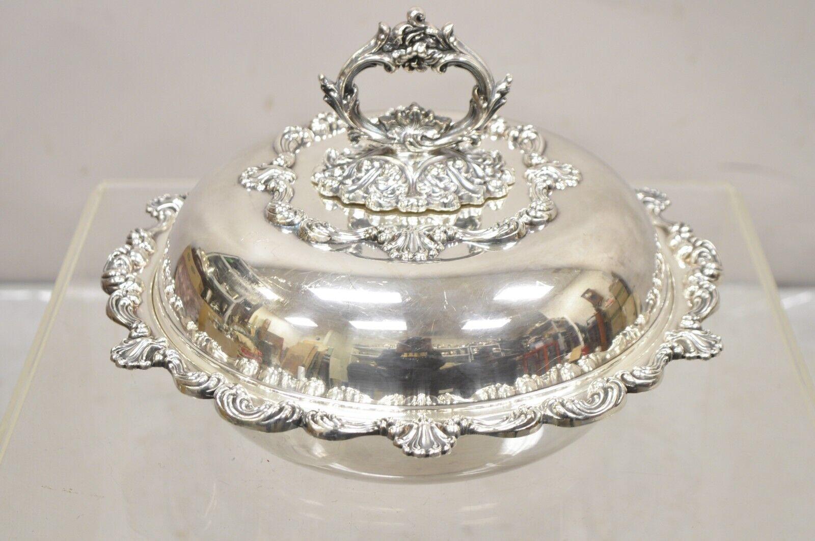 Antique English Victorian Ornate Round Silver Plated Rococo Lidded Serving Dish. Item features a heavy ornate removable handle, nice deep form, original hallmark, very nice vintage item. Circa Early to Mid  20th Century. Measurements:  8