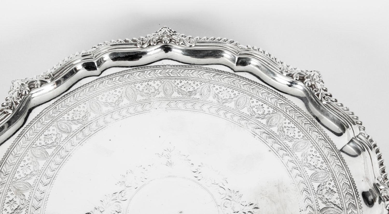 This is a wonderful antique silver plated Victorian salver bearing the makers mark of the renowned silversmith of Sheffield England, James Dixon, the inventory number 4523 and late 19th Century in date.

It has beautiful embossed and engraved