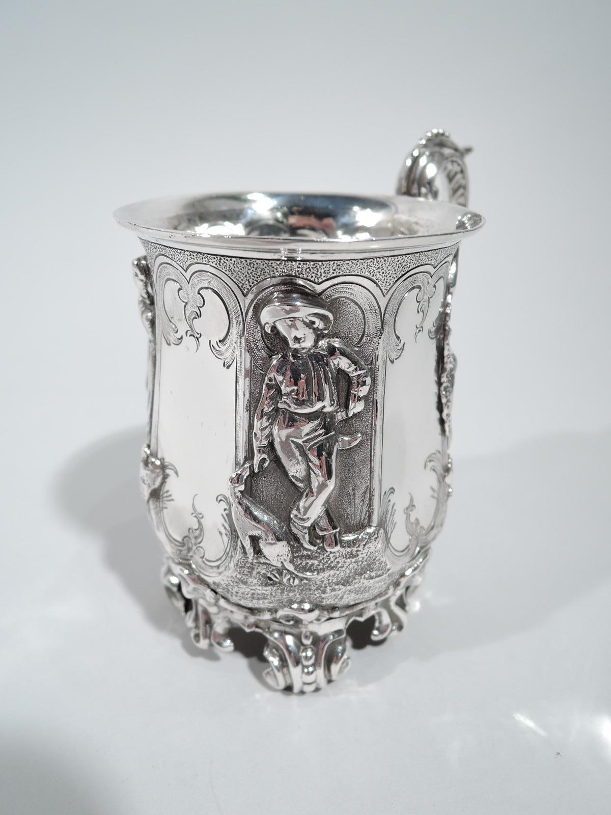 Victorian sterling silver baby cup. Made by Creswick & Co. in Sheffield in 1841. Bowl has alternating vacant panels and stippled ones with applied figures of which a garland girl, lounging boy, harvest worker, and cloaked figure by brazier.