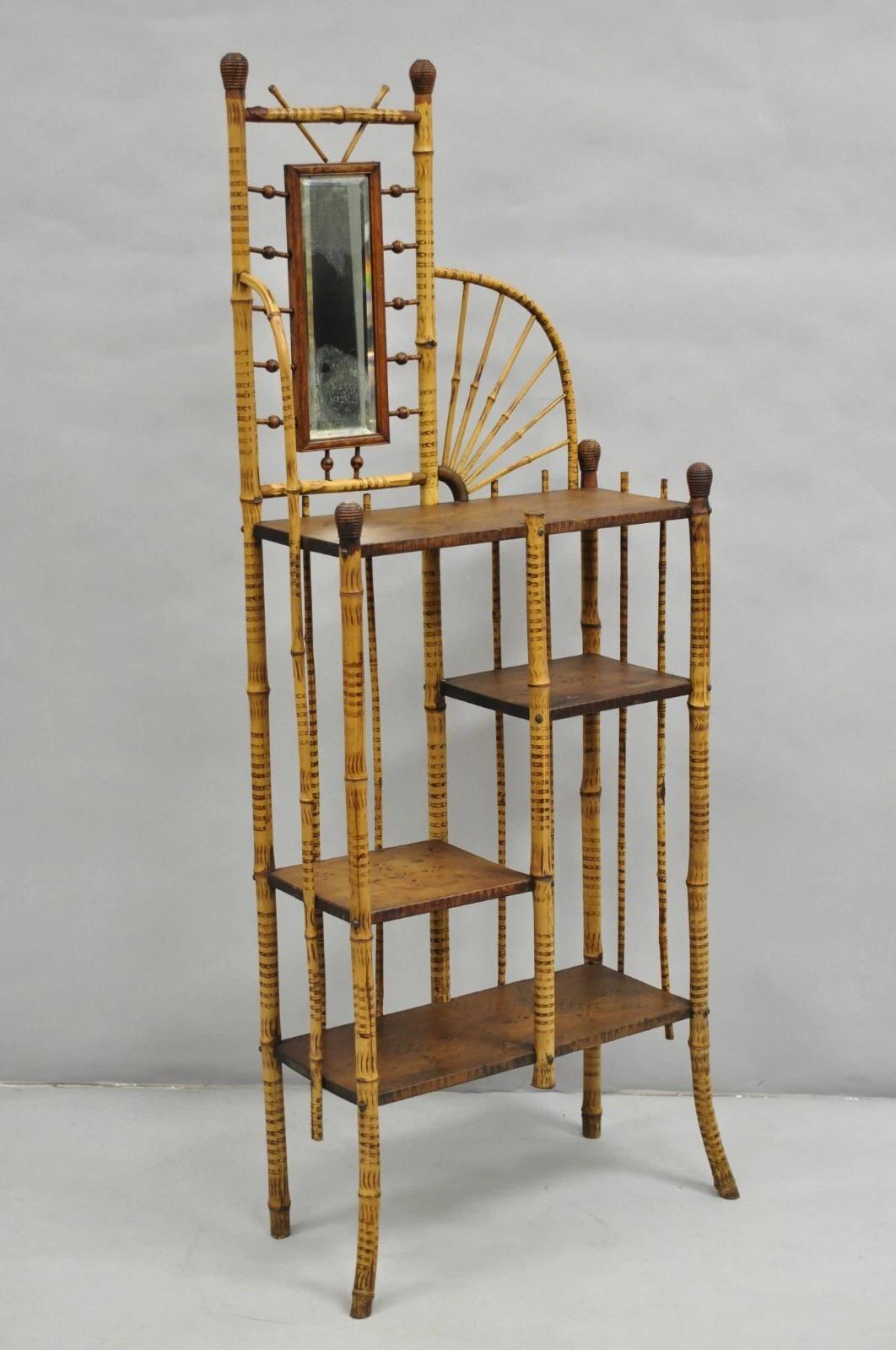 Antique English Victorian Stick and Ball Burnt Bamboo Curio Etagere Shelf with Beveled Glass Mirror. Circa Late 19th Century. Measurements: 55