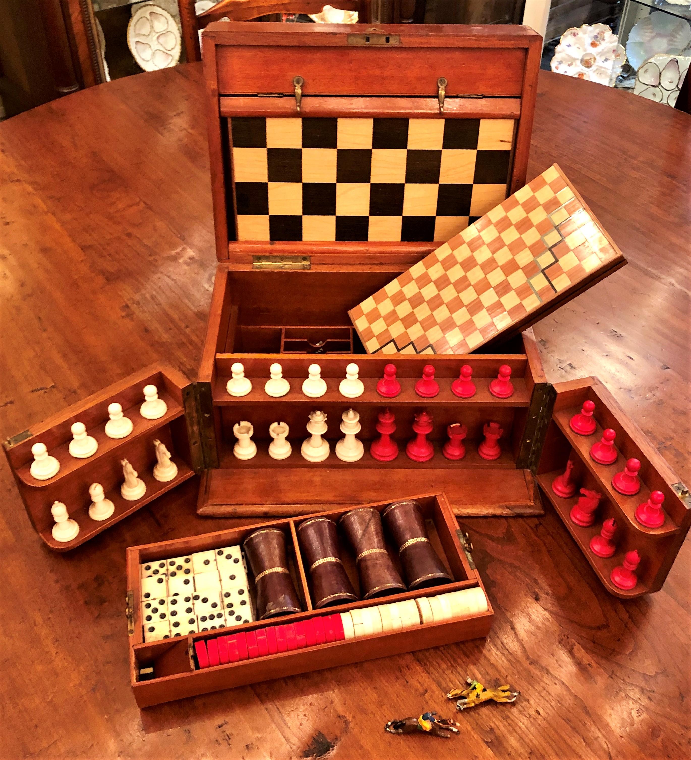 Antique English walnut games box compendium with all original games, circa 1890-1900.