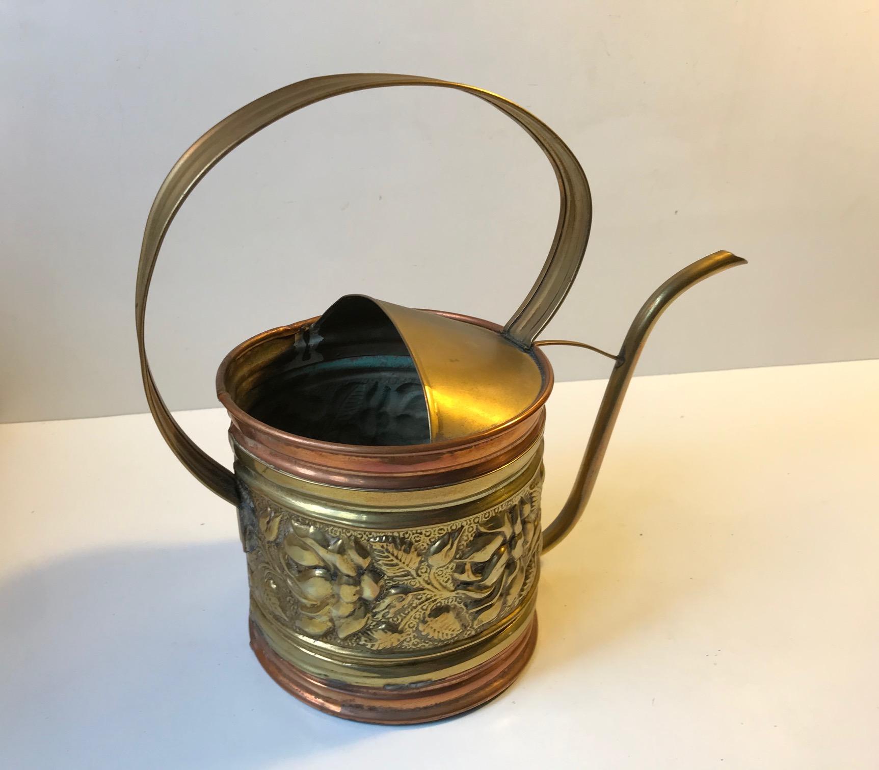 large copper watering can