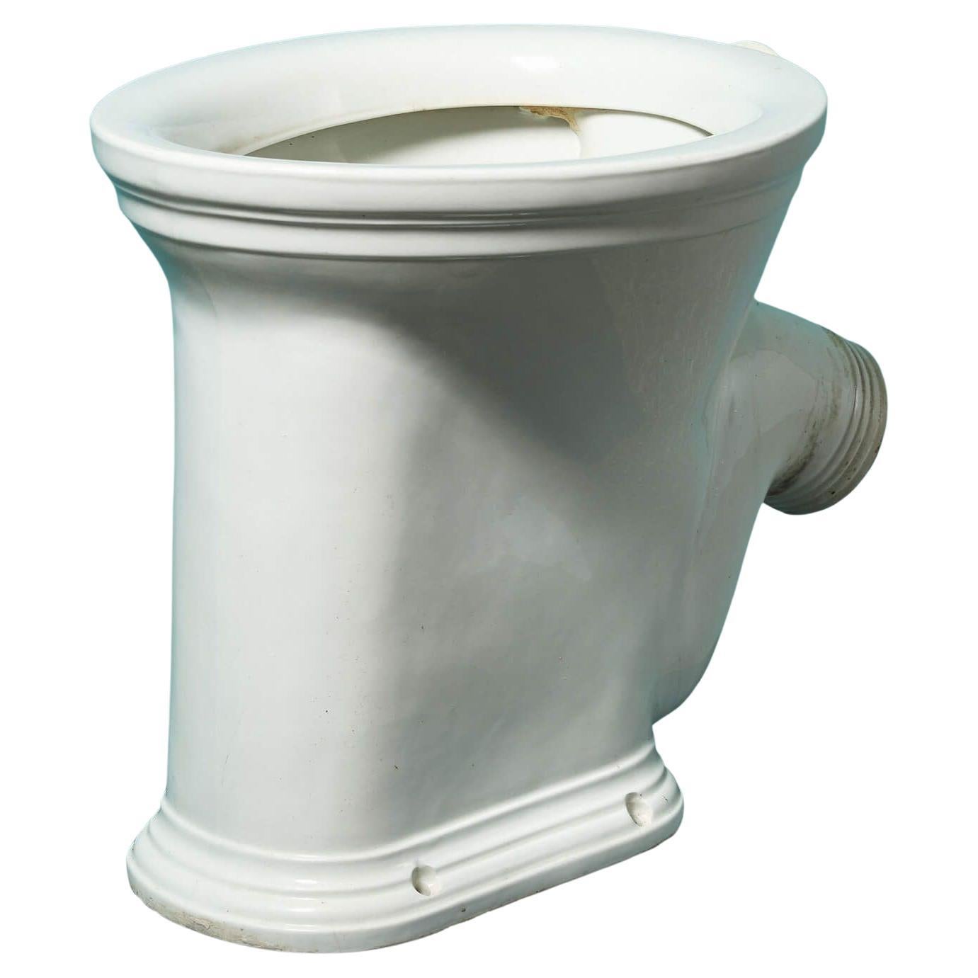 Antico wc inglese in ceramica smaltata bianca con scarico a P