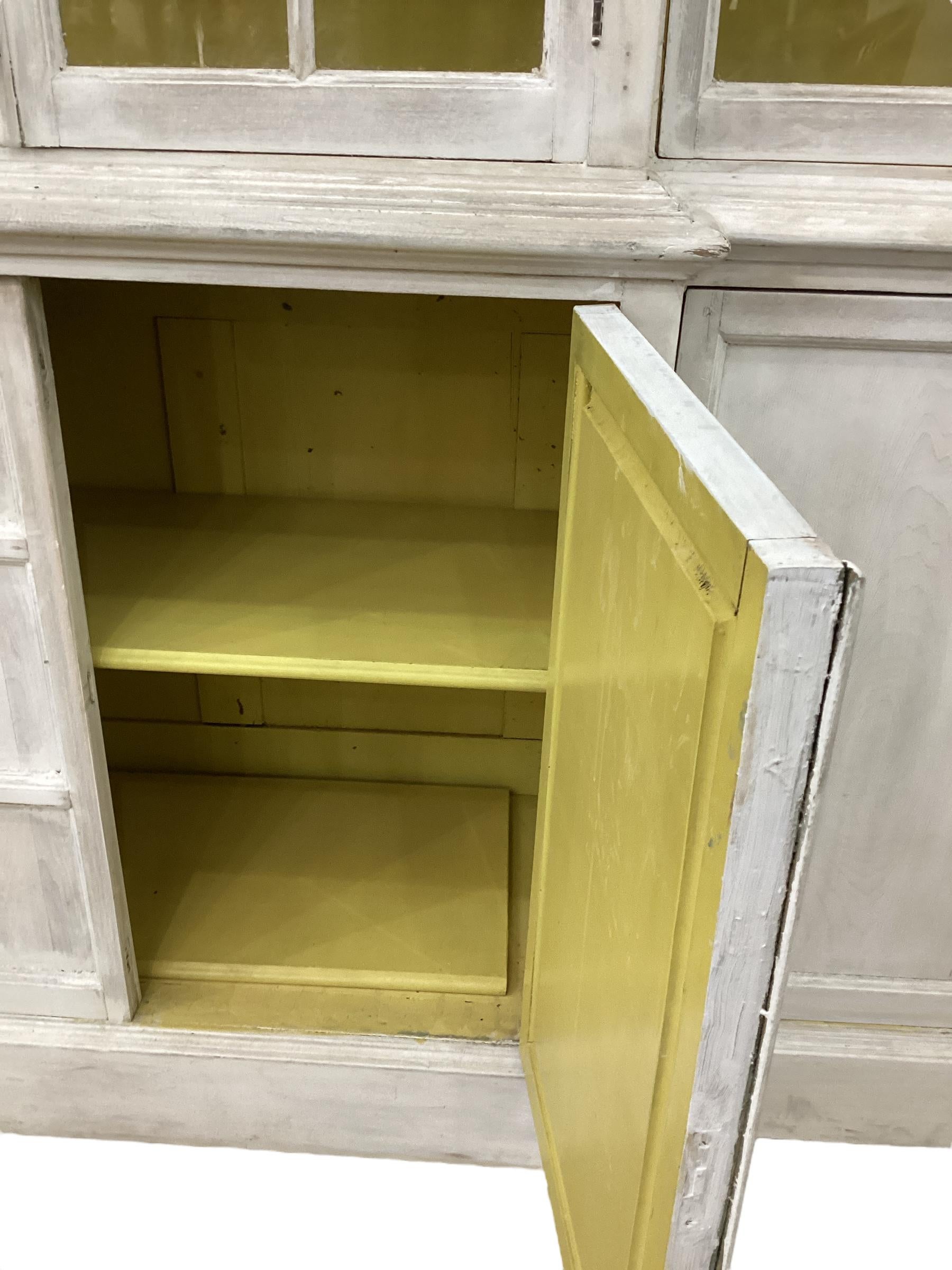 19th Century Antique English White Washed Glazed Front Step Back Bookcase For Sale