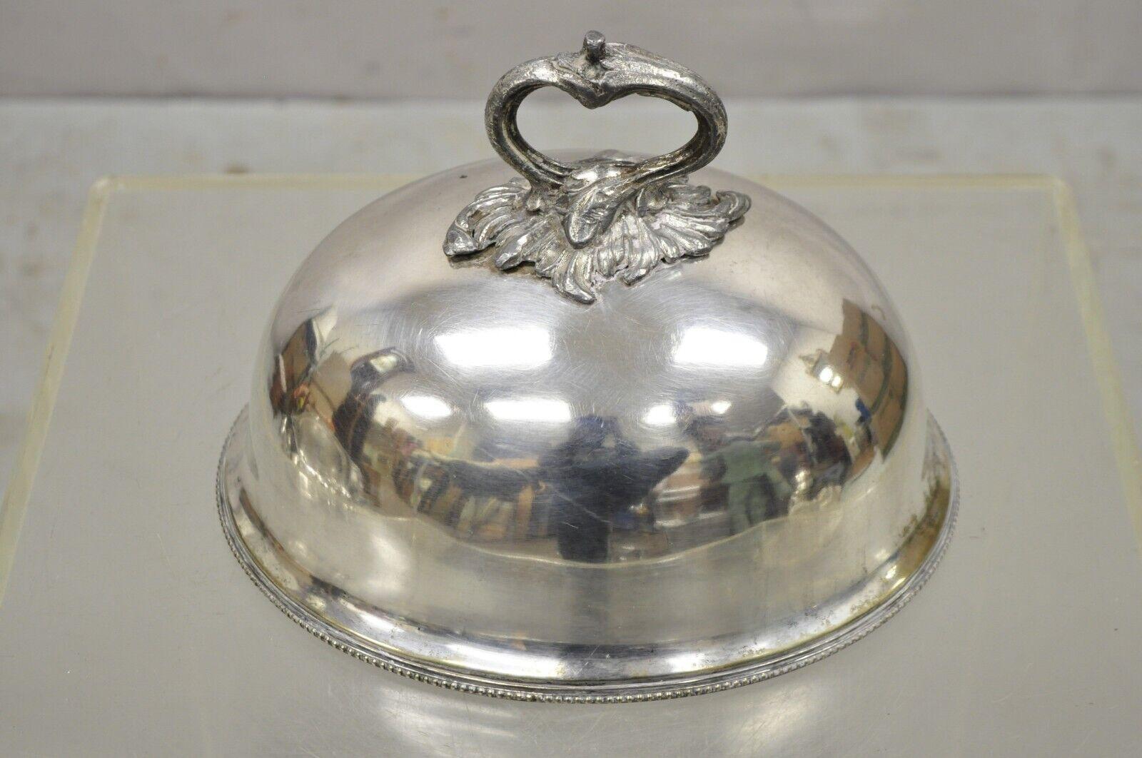 Antique English William Hutton Sons silver plated meat dish serving dome lid. Item features an ornate branch handle, oval dome shape, original stamp, very nice antique item, great style and form. circa early 1900s. Measurements: 7.5