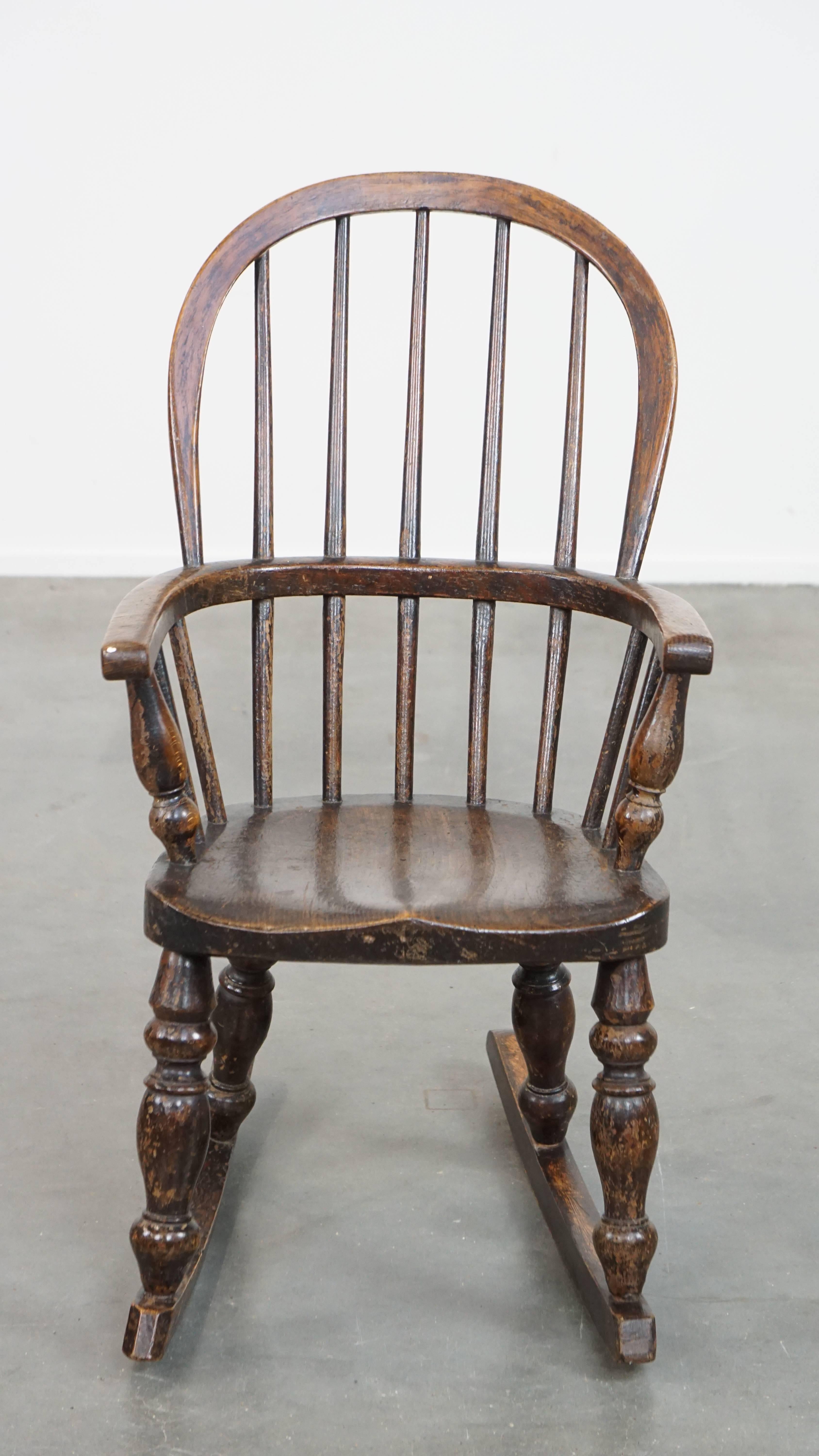 This incredibly charming antique English rocking chair in a children's size is not only delightful to look at, but also fully functional! It has a beautiful patina and is structurally in good condition and, as mentioned, ready for immediate use. Can