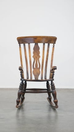 Antique English Windsor rocking chair with a beautiful and pure patina