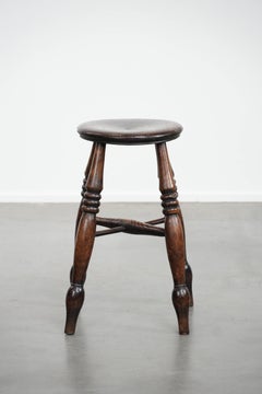 Antique English Windsor stool from the 18th century with a great patina