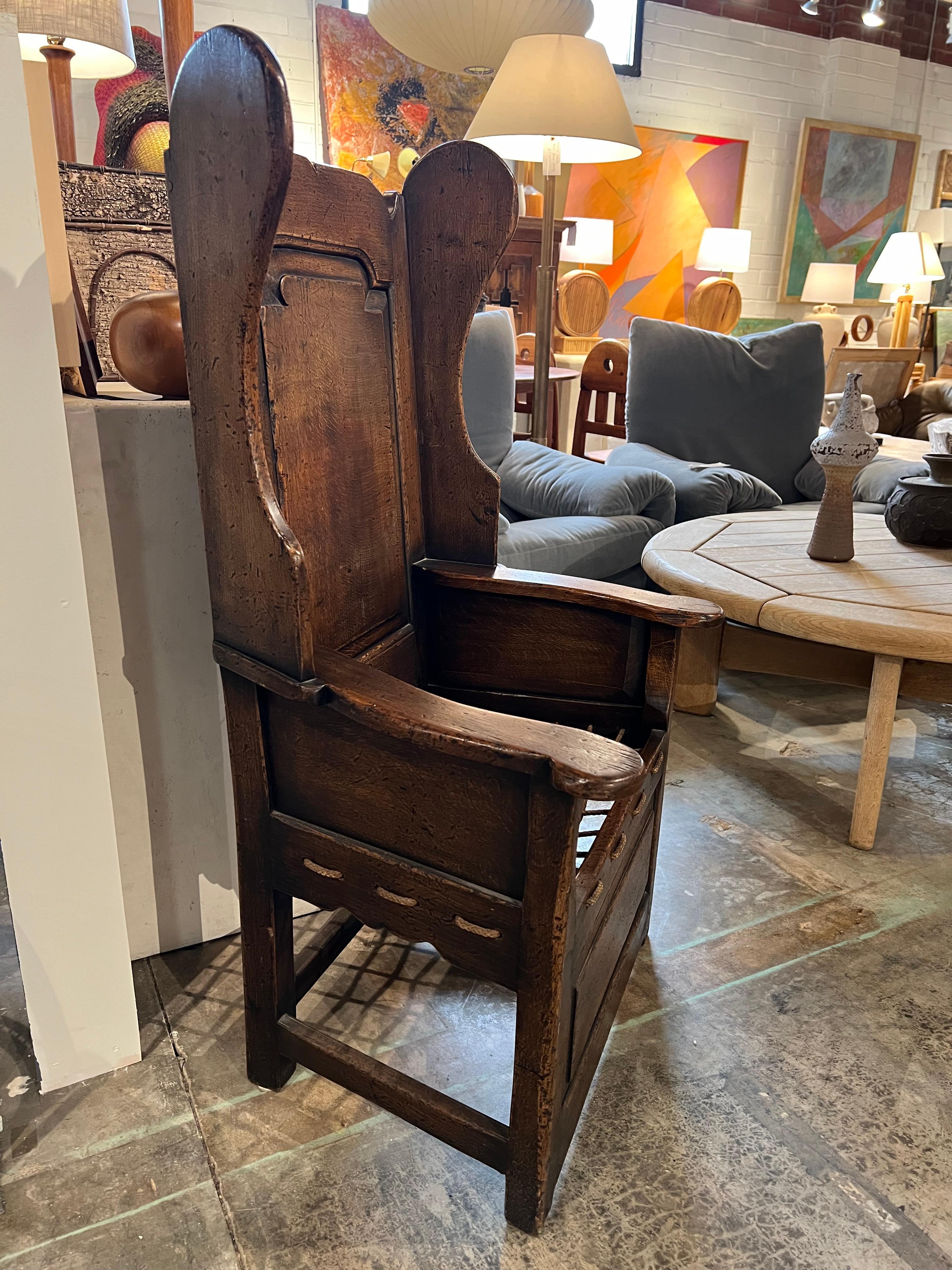 Late 1700’s English Oak Wing Chair. Arm height 23”