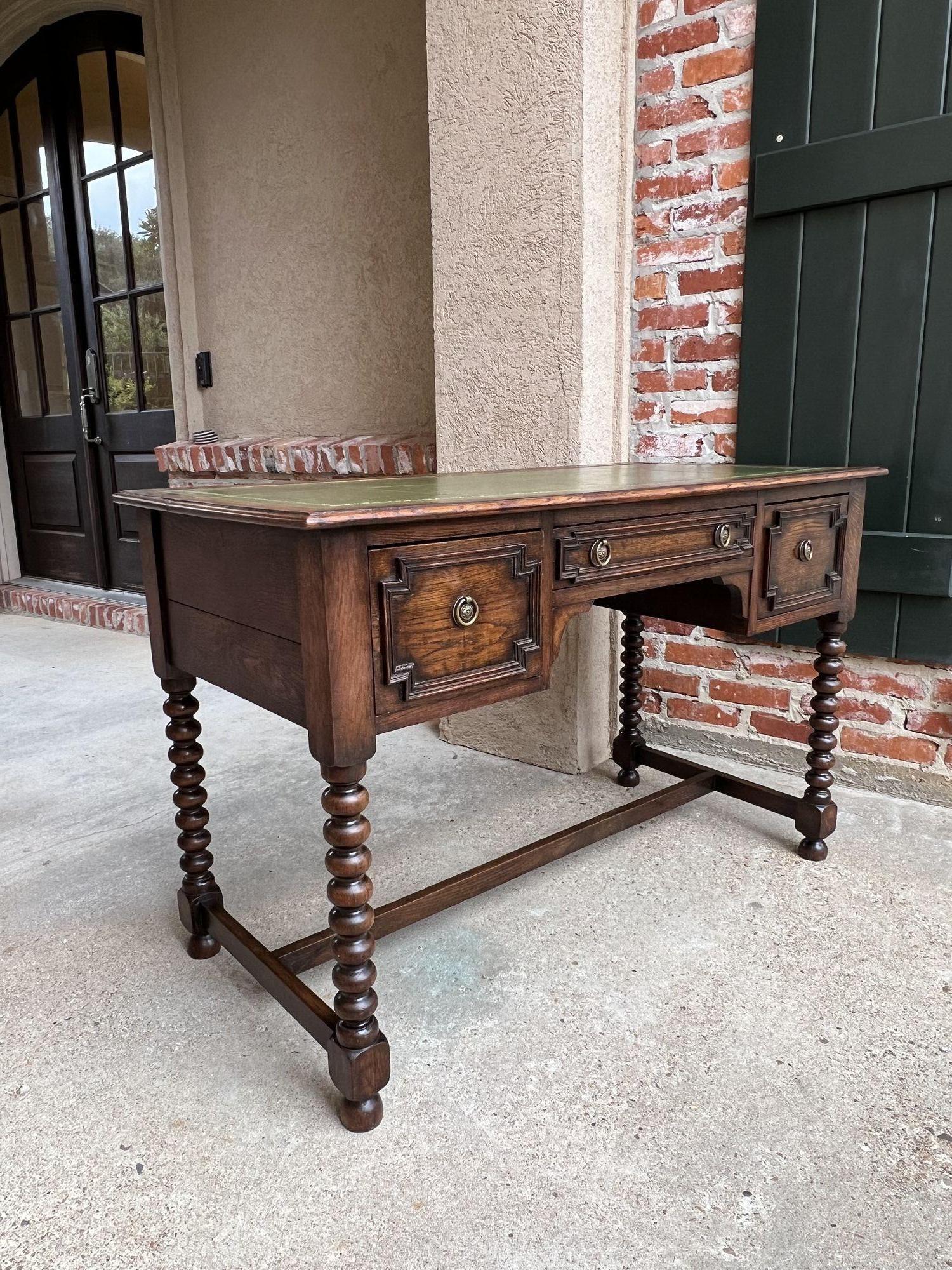 British Antique English Writing Desk Table Jacobean Carved Oak Green Leather Bobbin Leg