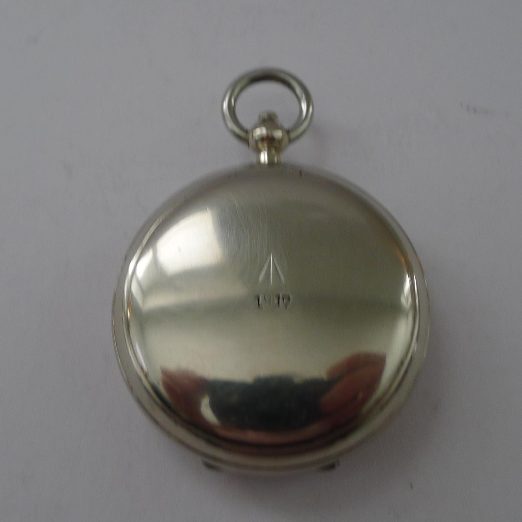A good nickel plated WW1 British Officers Military Pocket Compass engraved on the lid with the war office crow's foot mark and dated 1917

The hunter cased pocket compass has an attractive dial.  Excellent working order measuring 1 7/8