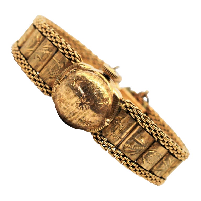 Reloj de pulsera para señora en oro amarillo de 14 quilates con