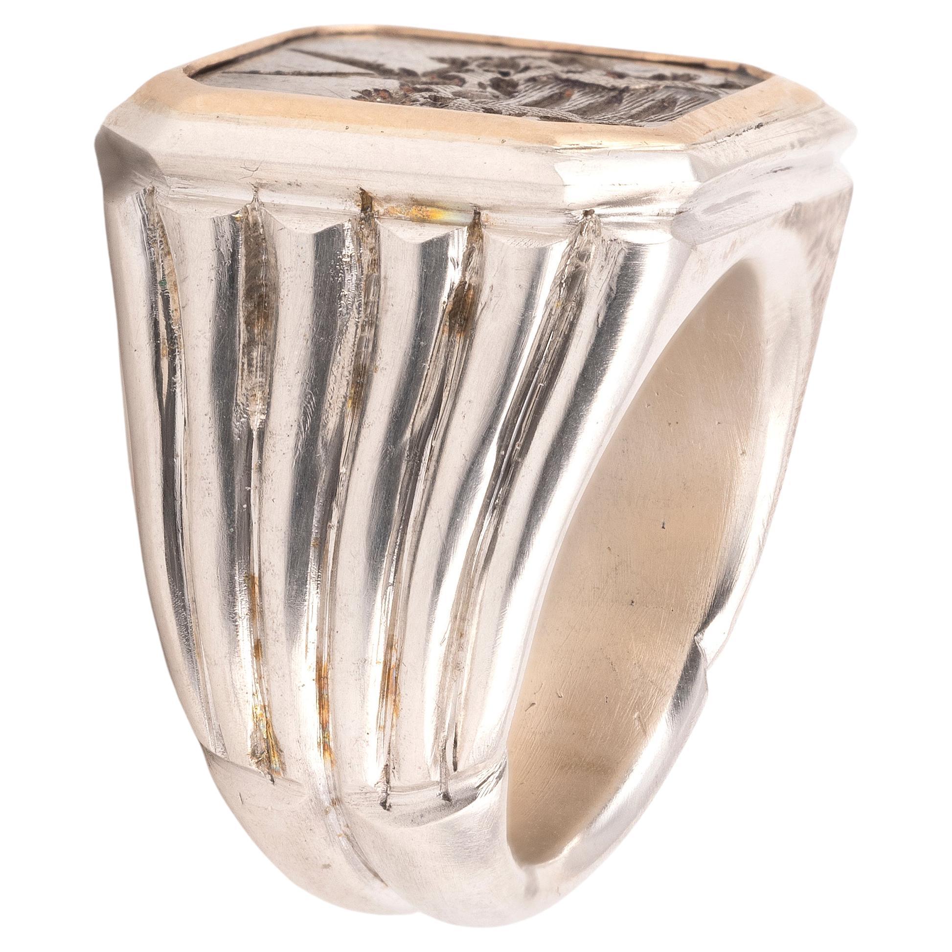 Italian, 1750s An antique silver ring is finely hand-engraved with a noble coat-of-arms. 
Top size 22mm x 21mm
Size 11
Weight : 43.25gr.