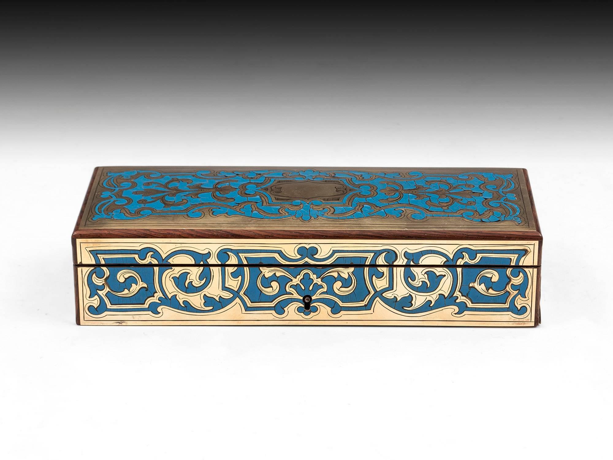 Boulle sewing box with beautiful engraved inlaid brass. With red silk paper and velvet lined interior with a removable tool tray fitted with various sewing tools with mother of pearl handles and elaborate engraving.

This exquisite eye-catching