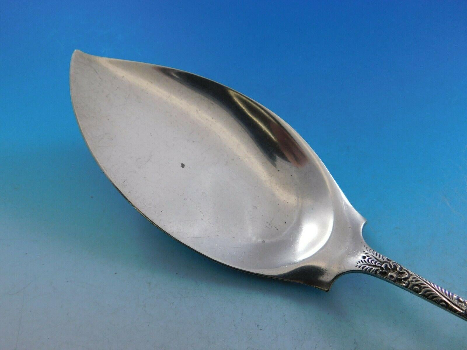 Antique engraved aka custom engraved by Tiffany and Co.

Masterfully crafted sterling silver ice cream server measuring 11