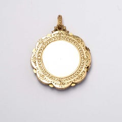 Antique Engraved Locket gold and silver coloured stone