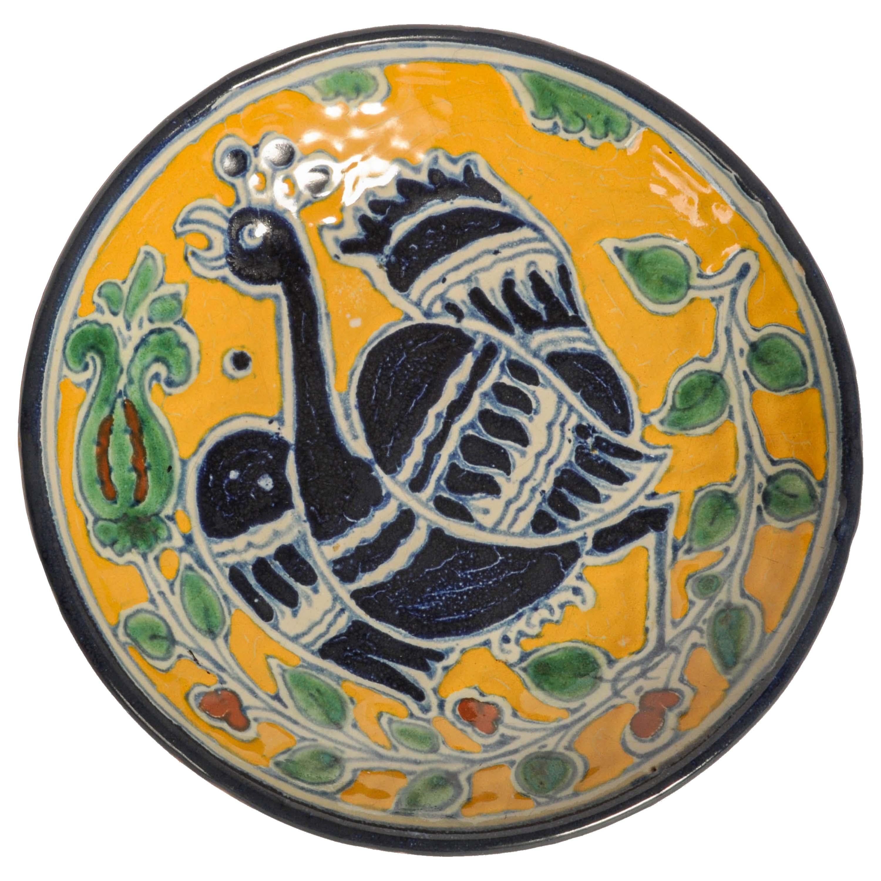 A good antique Talavera Poblana tin-glazed earthenware charger, Enrique Luis Ventosa (Spain, Mexico, 1868-1935) Puebla, Mexico, Renaissance style, circa 1910.
The charger/bowl was created by one of the most accomplished Spanish/Mexican potters of