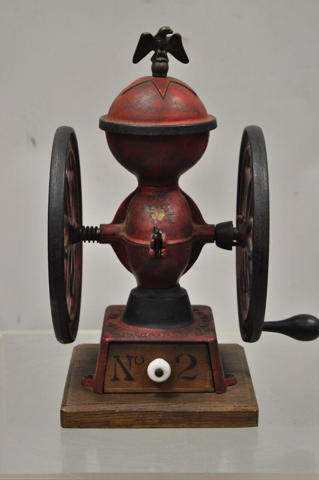 Vintage Recast of the Enterprise Mfg No.2 Red Black Cast Iron Coffee Grinder. I am told this recast was done for members of ACME (Association of Coffee Mill Enthusiasts). Item features a brass eagle finial, red and black painted finish, blue painted