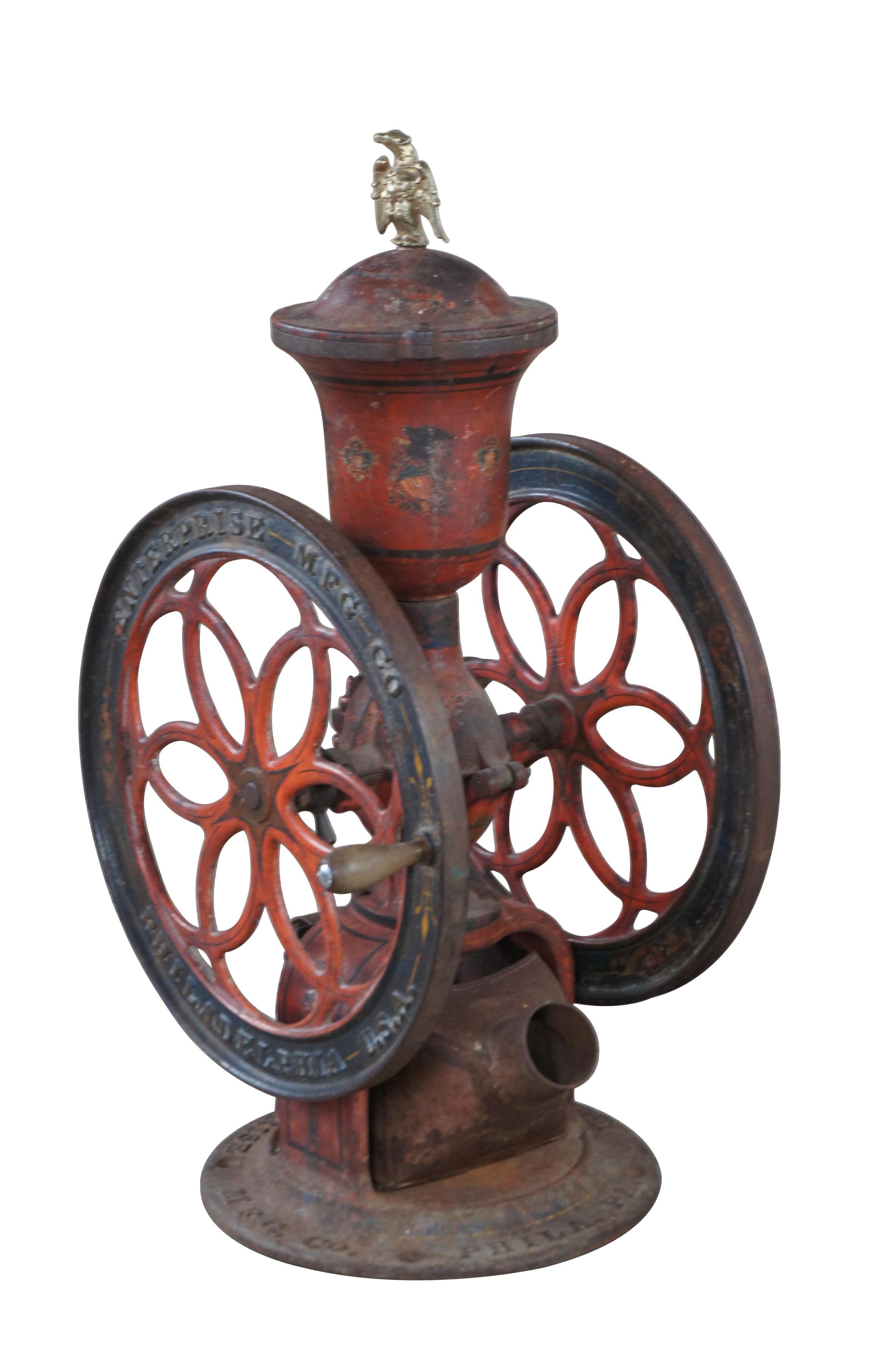 Antique Enterprise Mfg Co coffee grinder / mill, circa 1876. It is one of the largest and heaviest of the counter top grinders, made for the country general stores and farmhouses. This double wheeled coffee grinder is made of cast iron and features