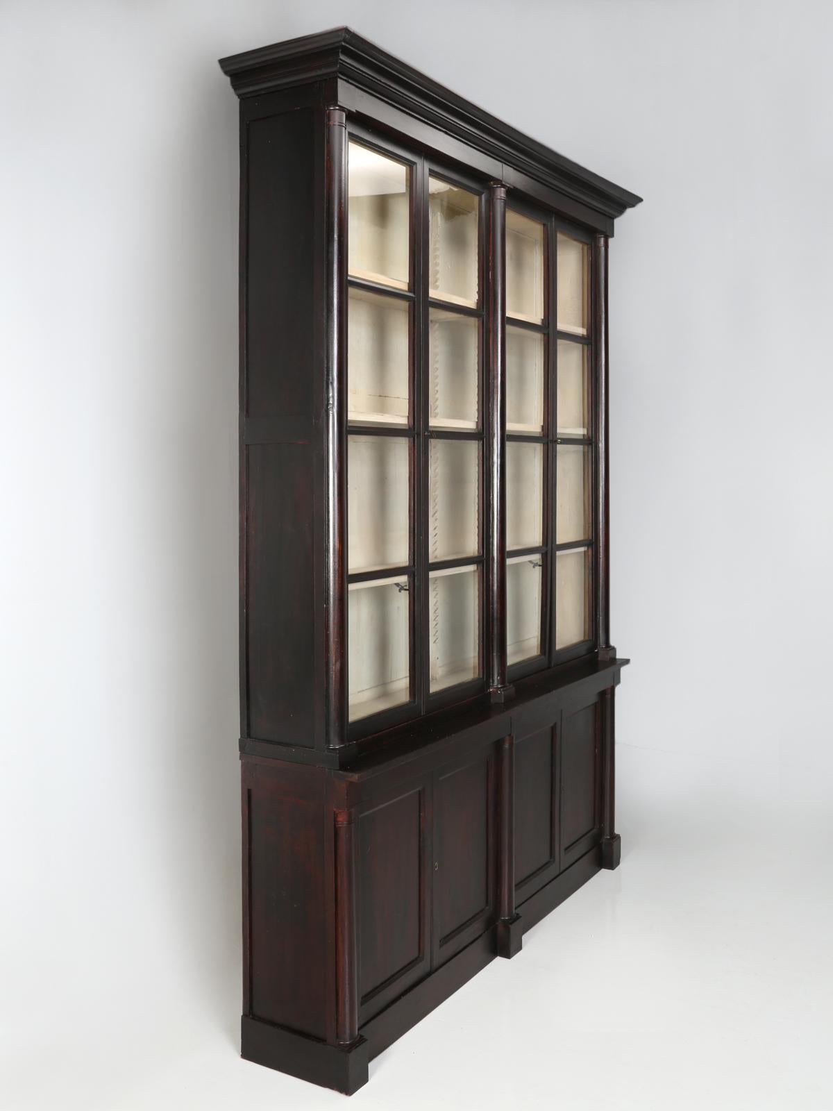 The French would refer to this antique bookcase as époque, meaning from the time of the Empire period and not just in the style of. Empire French furniture was an early 19th century (circa 1800 to the late 1820s) and represented the 2nd phase of