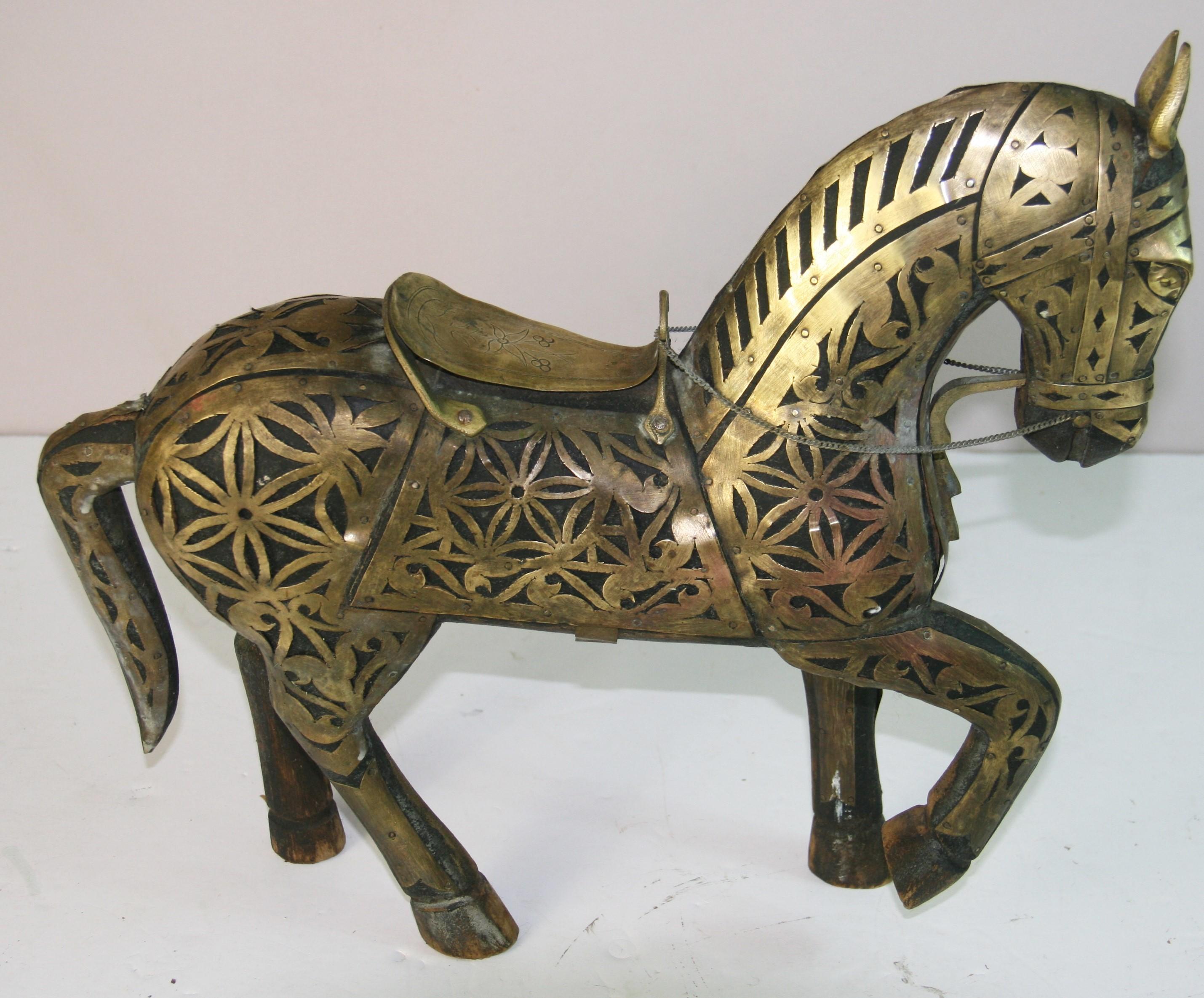 1832 Antique Equestrian Sculpture.
Hand carved wood horse rapped with shapped brass applied to wood.