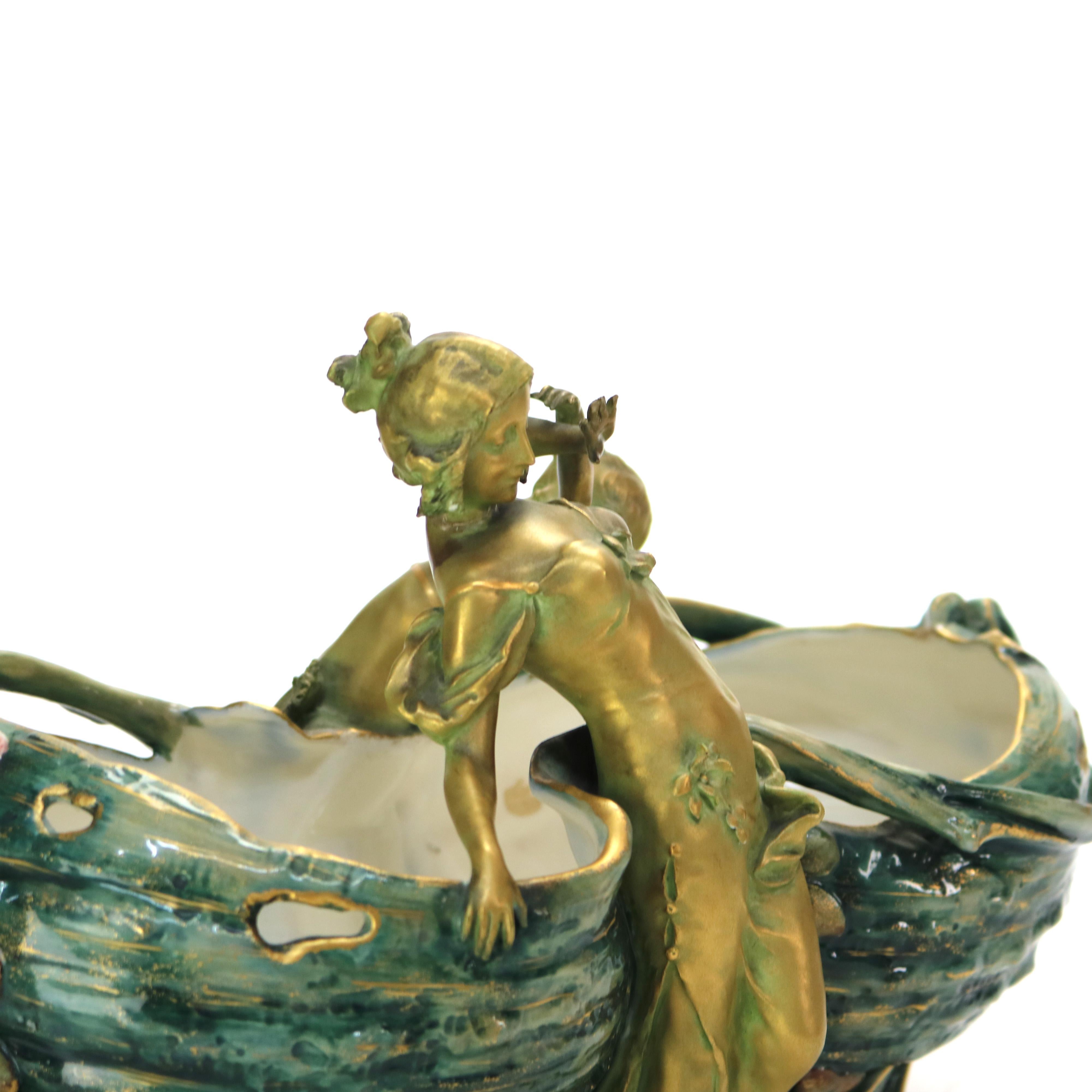 Antique Ernst Wahliss Turn Vienna Art Nouveau Parcel Gilt Porcelain Figural & Floral Centerpiece Signed C1900

Measures - 10.5
