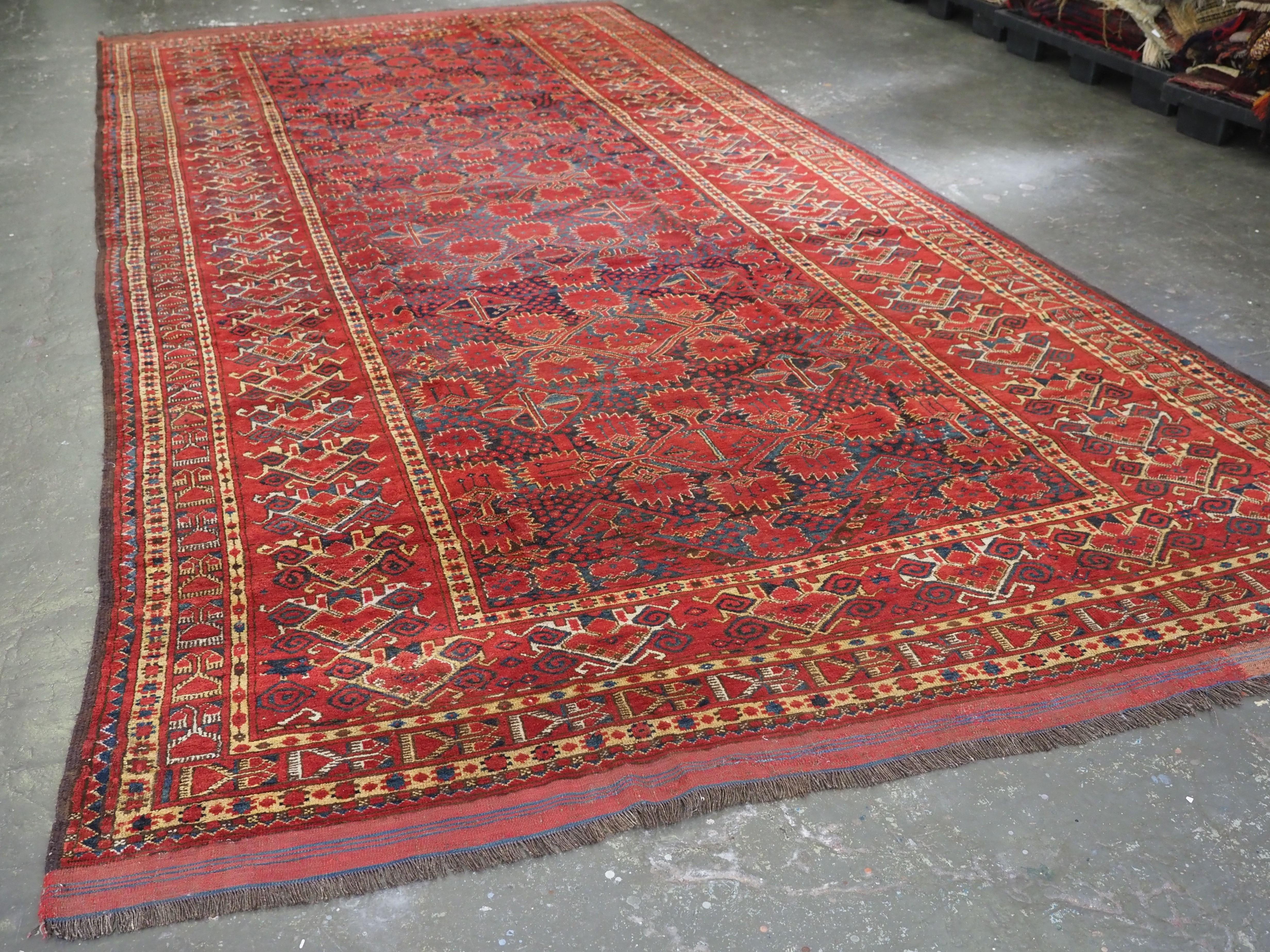 Size: 18ft 6in x 8ft 2in (565 x 250cm).

Antique Ersari Beshir Turkmen kelleh carpet of exceptional size.

Circa 1870 or earlier.

This exceptional tribal carpet originates from the border regions of norther Afghanistan. The abrashed indigo blue