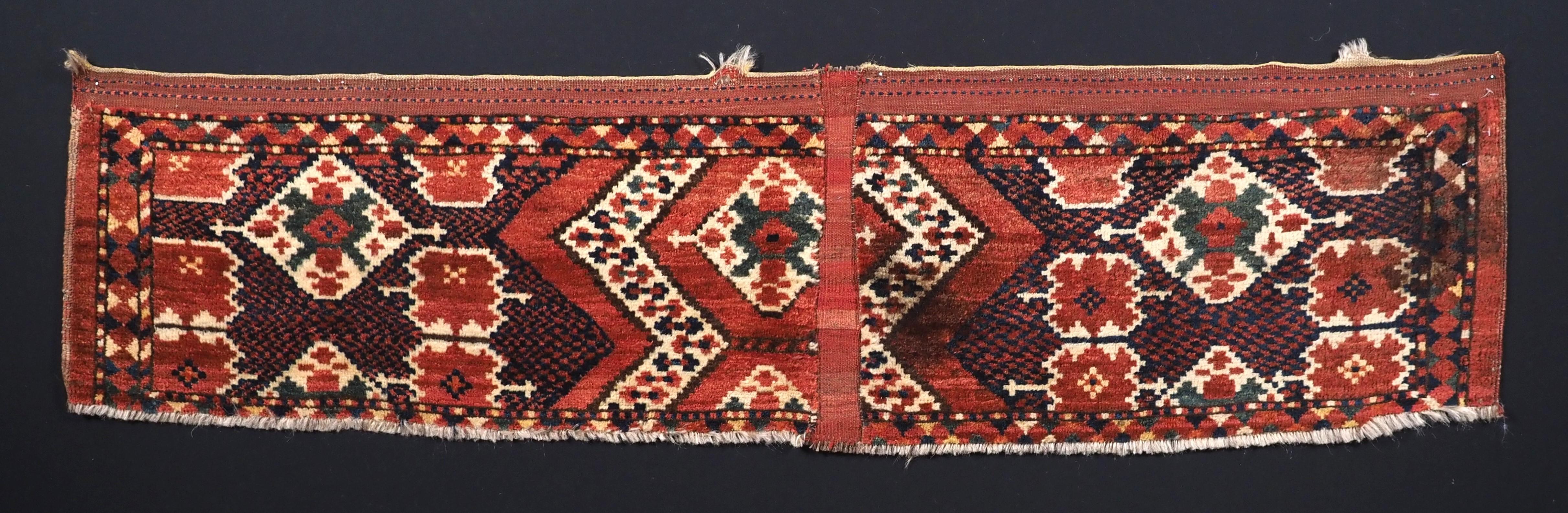 Size: 5ft 2in x 1ft 4in (157 x 41cm)

Antique Ersari Beshir Turkmen torba with ikat design.

Circa 1880.

Torba are shallow wall bags used mainly in tents or yurts for the storage of personal belongings, they were also used to decorate the sides of