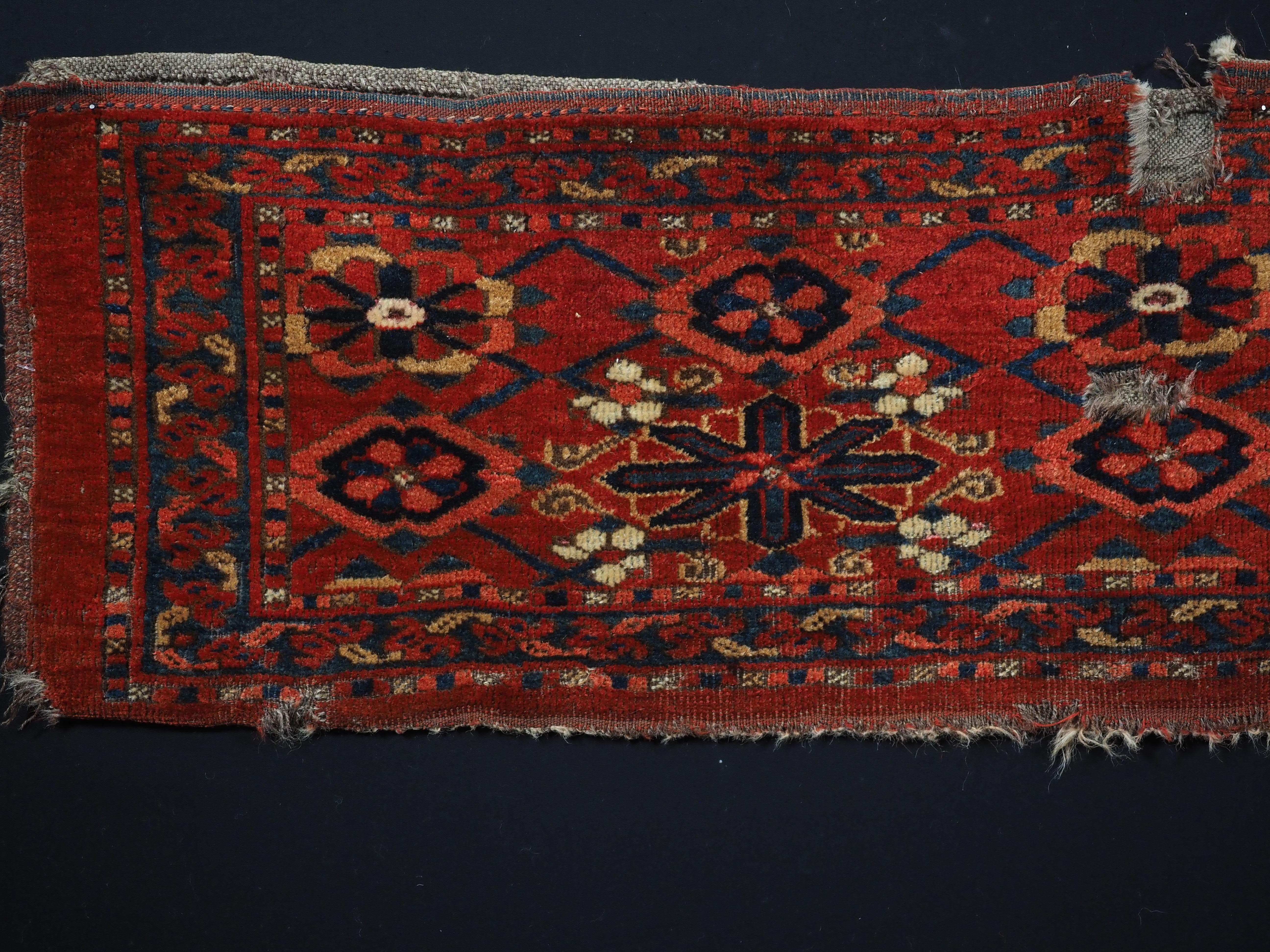 Size: 3ft 10in x 1ft 1in (117 x 34cm)

Antique Ersari Beshir Turkmen torba with mina khani design.

Circa 1870.

Torba are shallow wall bags used mainly in tents or yurts for the storage of personal belongings, they were also used to decorate the