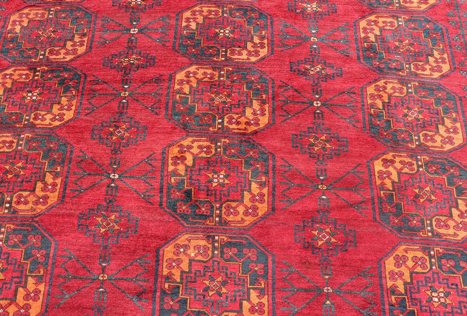 20th Century Antique Ersari Rug in Wool with Gul Design in Ivory, Blue, Red and Orange For Sale